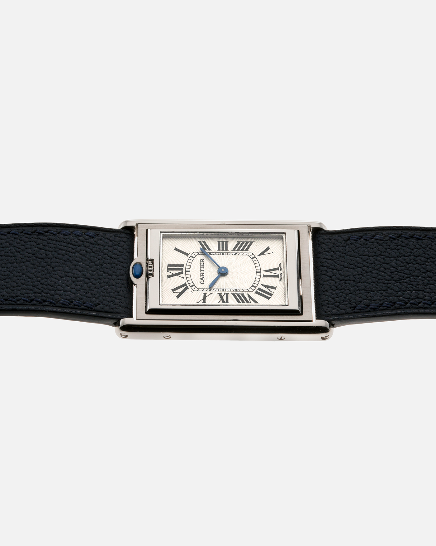 Brand: Cartier Year: 1990’s Model: Tank Basculante Reference: 2390 Material: Stainless Steel Movement: Piguet-derived Cartier Cal. 050 MC, Manual-Winding Case Diameter: 26mm x 38mm Strap: Alexandre Ritz Navy Blue Calf Leather Strap with Signed Stainless Steel Tang Buckle