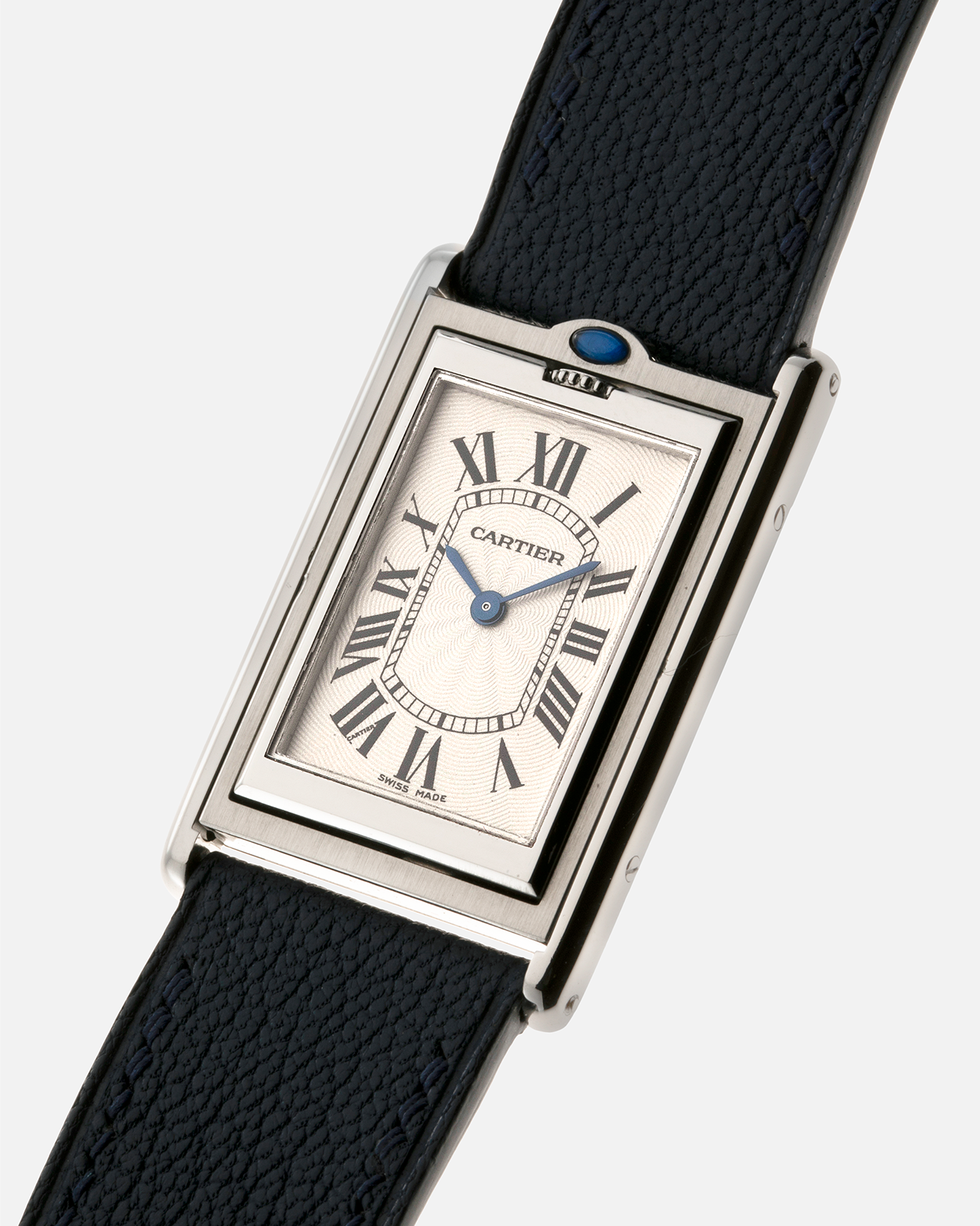 Brand: Cartier Year: 1990’s Model: Tank Basculante Reference: 2390 Material: Stainless Steel Movement: Piguet-derived Cartier Cal. 050 MC, Manual-Winding Case Diameter: 26mm x 38mm Strap: Alexandre Ritz Navy Blue Calf Leather Strap with Signed Stainless Steel Tang Buckle