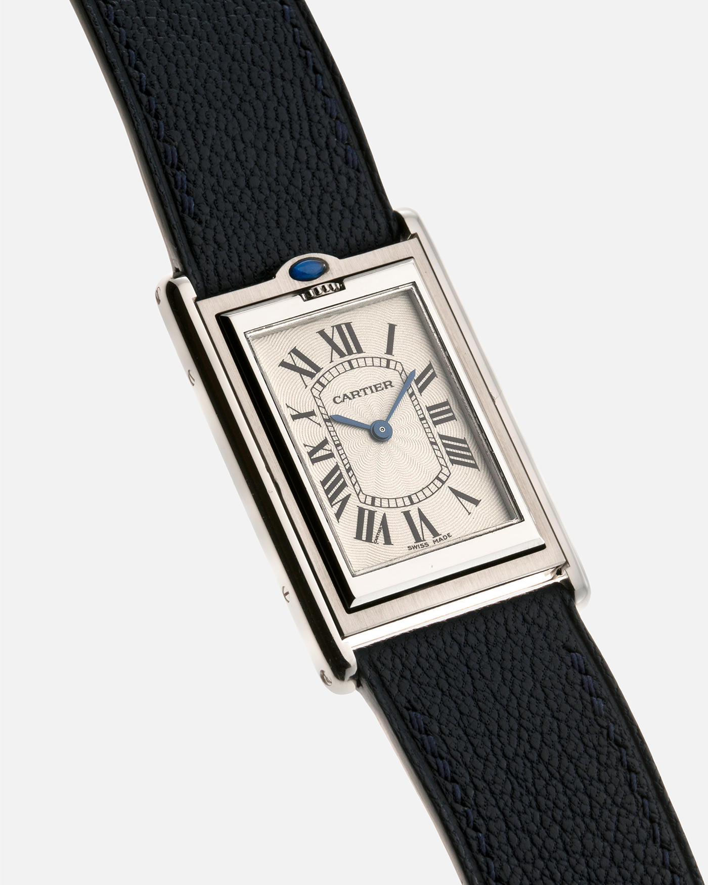 Brand: Cartier Year: 1990’s Model: Tank Basculante Reference: 2390 Material: Stainless Steel Movement: Piguet-derived Cartier Cal. 050 MC, Manual-Winding Case Diameter: 26mm x 38mm Strap: Alexandre Ritz Navy Blue Calf Leather Strap with Signed Stainless Steel Tang Buckle