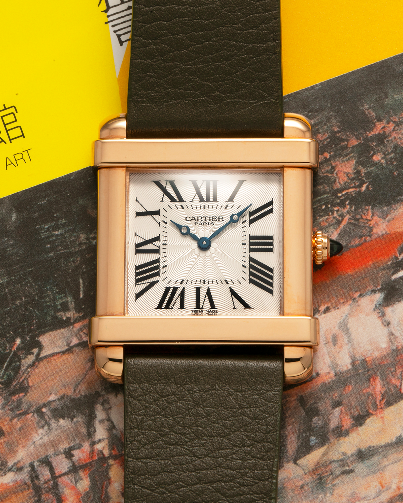 Brand: Cartier
Year: 2006
Model: Collection Privée Cartier Paris Tank Chinoise
Reference Number: 2684G
Material: 18-carat Rose Gold
Movement: Cartier Cal. 437 MC (Based on Piaget Cal. 430P), Manual-Winding
Case Dimensions: 28mm x 29mm x 8mm (37mm Lug-to-Lug)
Lug Width: 21mm
Strap: Custom Khaki Camille Fourmet Leather Strap with Signed 18-carat Rose Gold Deployant Clasp