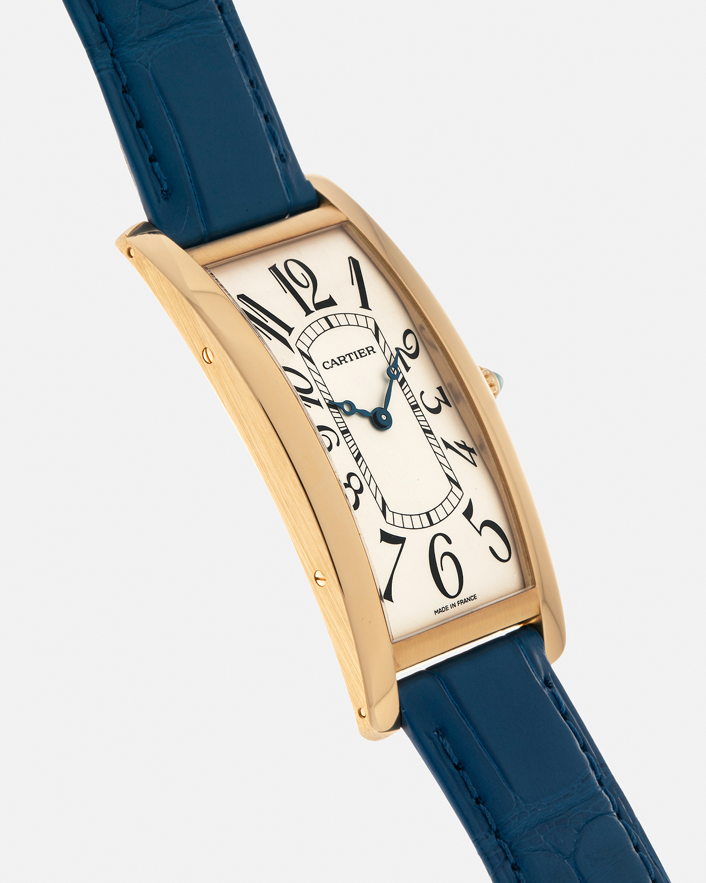 Brand: Cartier
Year: 2000s
Model: Collection Privée Cartier Paris Tank Cintrée, Limited to 150 pieces
Reference: 2718
Material: 18-carat Yellow Gold
Movement: Cartier Cal. 8780 MC (Based on JLC Cal. 849), Manual-Winding
Case Dimensions: 46mm (Including Lugs) x 23 mm x 6.4mm
Lug Width: 16mm
Strap: Cartier Cobalt Blue Alligator Leather Strap with Signed 18-carat Yellow Gold Deployant Clasp