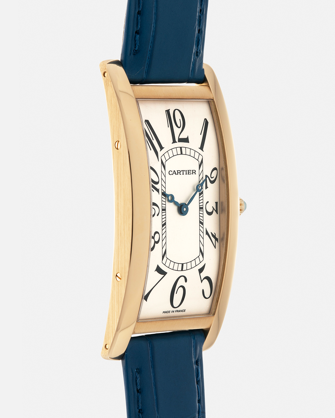 Brand: Cartier
Year: 2000s
Model: Collection Privée Cartier Paris Tank Cintrée, Limited to 150 pieces
Reference: 2718
Material: 18-carat Yellow Gold
Movement: Cartier Cal. 8780 MC (Based on JLC Cal. 849), Manual-Winding
Case Dimensions: 46mm (Including Lugs) x 23 mm x 6.4mm
Lug Width: 16mm
Strap: Cartier Cobalt Blue Alligator Leather Strap with Signed 18-carat Yellow Gold Deployant Clasp