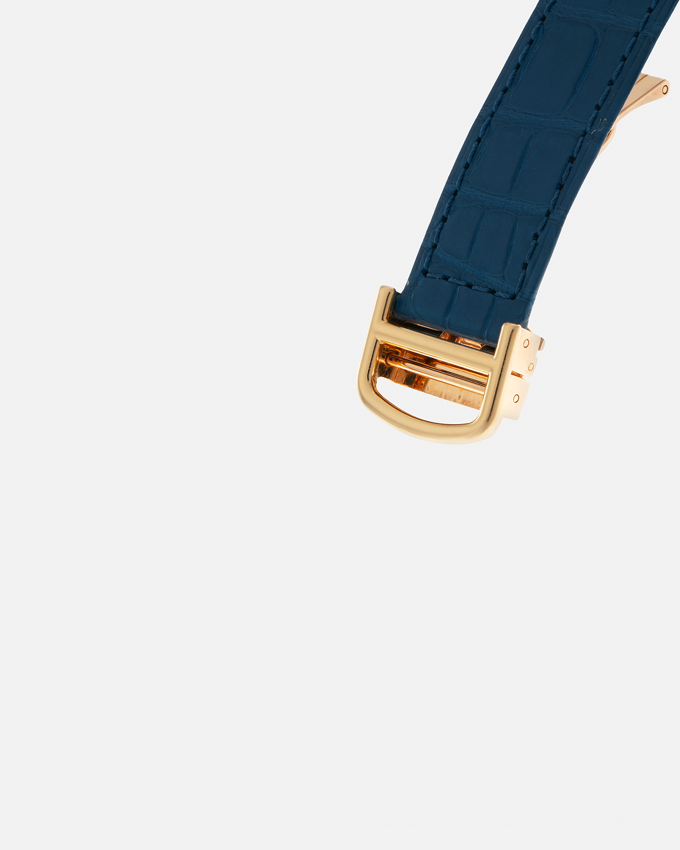 Brand: Cartier
Year: 2000s
Model: Collection Privée Cartier Paris Tank Cintrée, Limited to 150 pieces
Reference: 2718
Material: 18-carat Yellow Gold
Movement: Cartier Cal. 8780 MC (Based on JLC Cal. 849), Manual-Winding
Case Dimensions: 46mm (Including Lugs) x 23 mm x 6.4mm
Lug Width: 16mm
Strap: Cartier Cobalt Blue Alligator Leather Strap with Signed 18-carat Yellow Gold Deployant Clasp