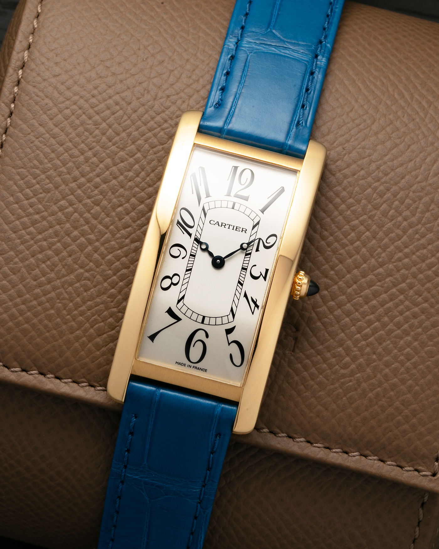Brand: Cartier
Year: 2000s
Model: Collection Privée Cartier Paris Tank Cintrée, Limited to 150 pieces
Reference: 2718
Material: 18-carat Yellow Gold
Movement: Cartier Cal. 8780 MC (Based on JLC Cal. 849), Manual-Winding
Case Dimensions: 46mm (Including Lugs) x 23 mm x 6.4mm
Lug Width: 16mm
Strap: Cartier Cobalt Blue Alligator Leather Strap with Signed 18-carat Yellow Gold Deployant Clasp