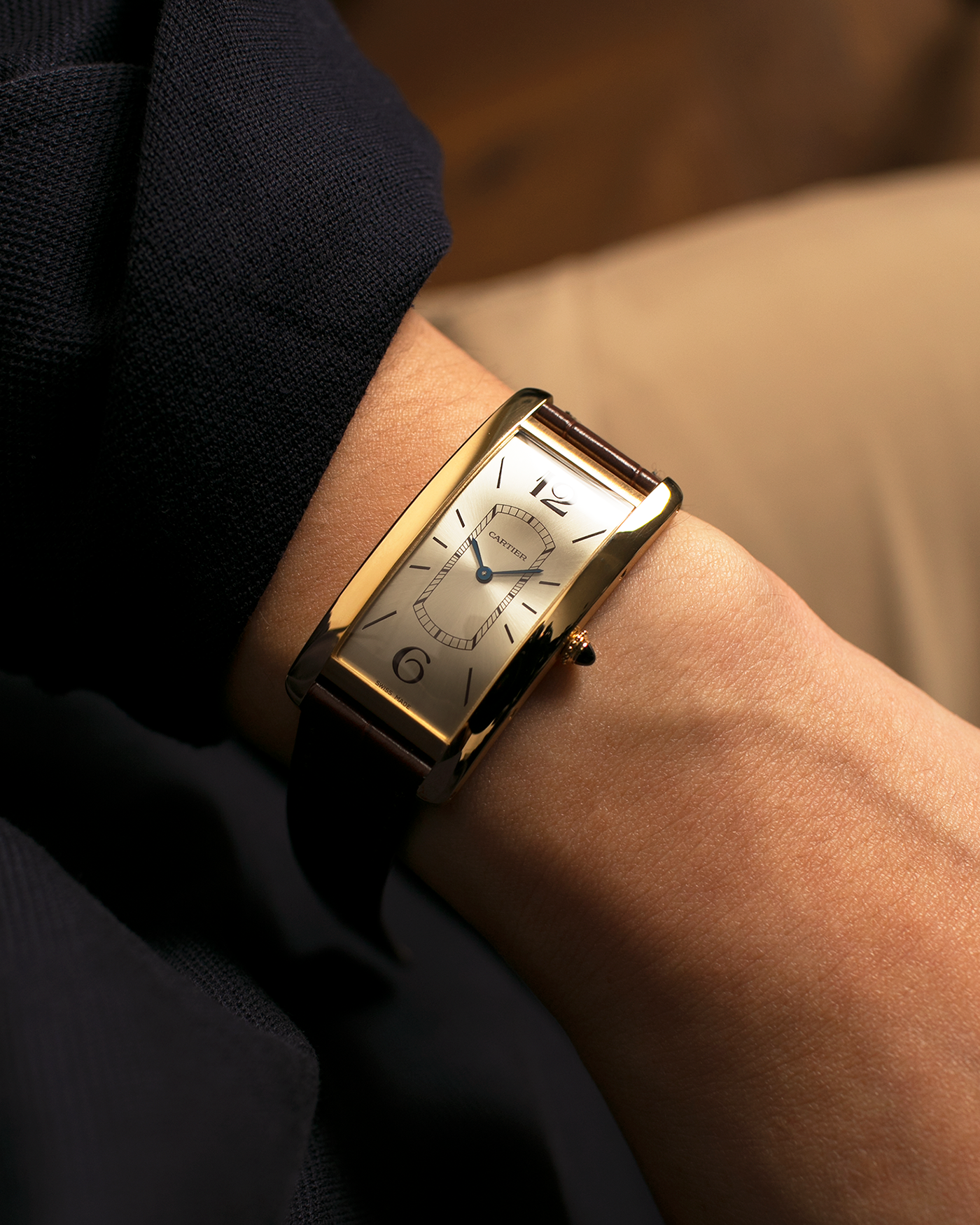 Brand: Cartier
Year: 2022
Model: Tank Cintrée
Reference: WGTA0026, 4123
Material: 18-carat Yellow Gold
Movement: Cartier Cal. 8971 MC (Based on JLC Cal. 846), Manual-Winding
Case Dimensions: 46.3mm (Including Lugs) x 23 mm
Lug Width: 16mm
Strap: Cartier Semi-Matt Brown Alligator Leather Strap with Signed 18-carat Yellow Gold Tang Buckle