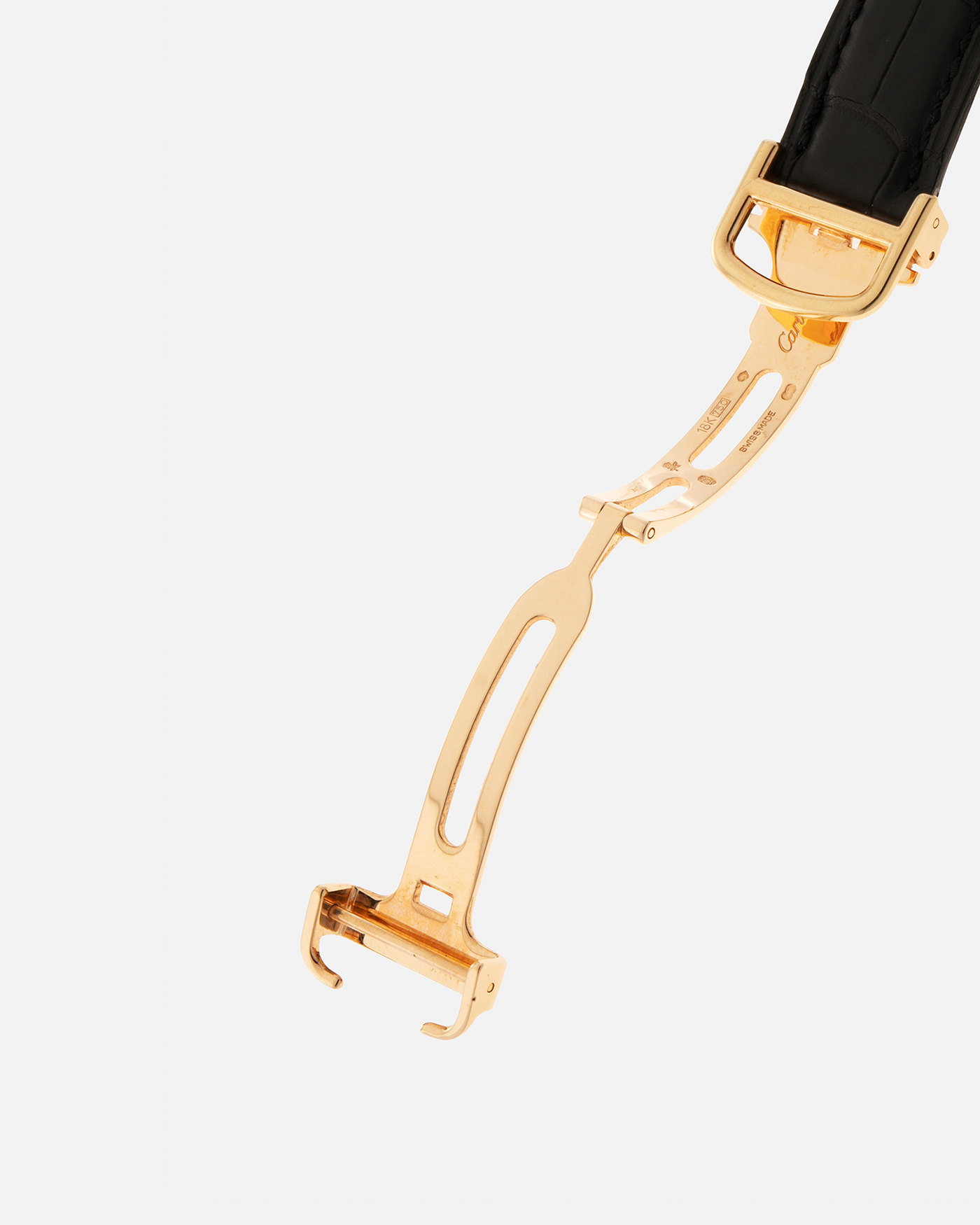 Brand: Cartier Year: 2005 Model: Collection Privée Cartier Paris Tank Cintrée, Limited to 150 pieces Reference: 2718 Material: 18-carat Yellow Gold Movement: Cartier Cal. 8780 MC (Based on JLC Cal. 849), Manual-Winding Case Dimensions: 46mm x 23mm Lug Width: 16mm Strap: Cartier Black Alligator Leather with Signed 18-carat Yellow Gold Deployant Clasp