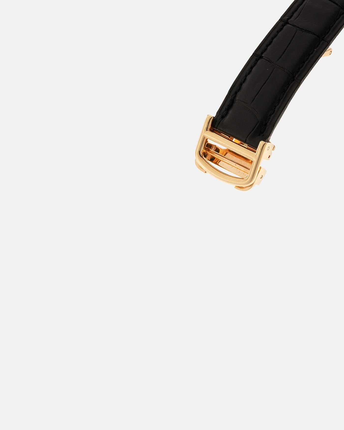 Brand: Cartier Year: 2005 Model: Collection Privée Cartier Paris Tank Cintrée, Limited to 150 pieces Reference: 2718 Material: 18-carat Yellow Gold Movement: Cartier Cal. 8780 MC (Based on JLC Cal. 849), Manual-Winding Case Dimensions: 46mm x 23mm Lug Width: 16mm Strap: Cartier Black Alligator Leather with Signed 18-carat Yellow Gold Deployant Clasp