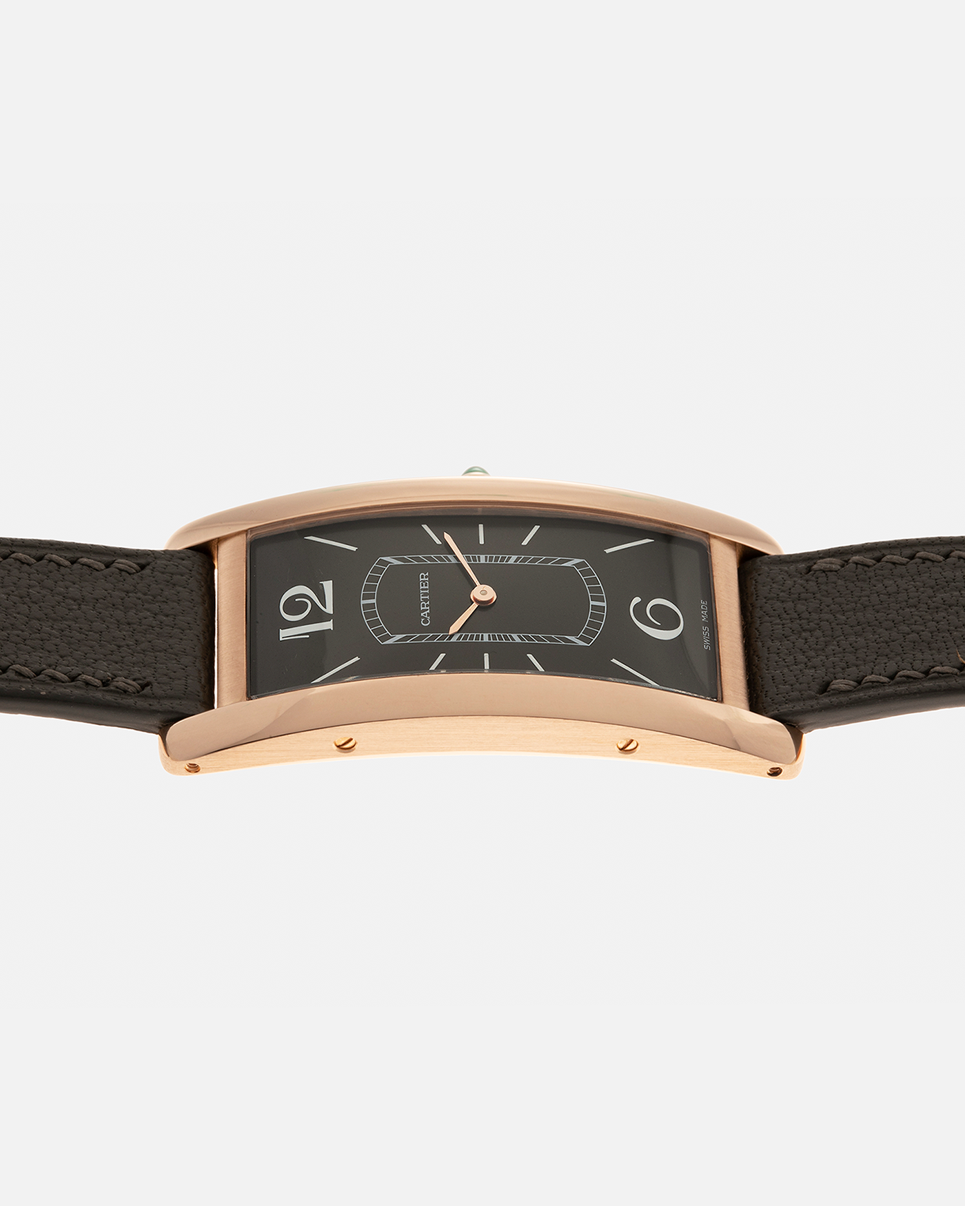Brand: Cartier Year: 2021 Model: Tank Cintrée Reference: WGTA0025 Material: 18-carat Rose Gold Movement: Cartier Cal. 8971 MC (Based on JLC Cal. 846), Manual-Winding Case Diameter: 46.3mm x 23 mm Lug Width: 16mm Strap: Semi-Matt Grey Leather Strap with Signed 18-carat Rose Gold Tang Buckle