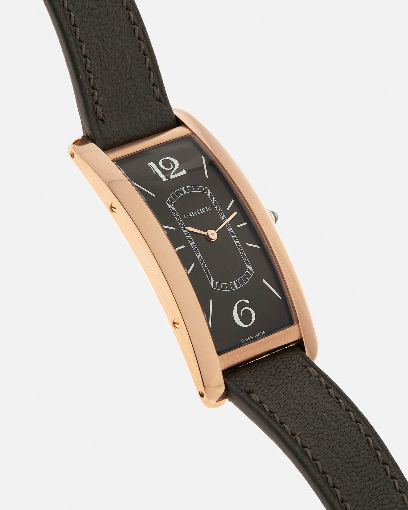 Brand: Cartier Year: 2021 Model: Tank Cintrée Reference: WGTA0025 Material: 18-carat Rose Gold Movement: Cartier Cal. 8971 MC (Based on JLC Cal. 846), Manual-Winding Case Diameter: 46.3mm x 23 mm Lug Width: 16mm Strap: Semi-Matt Grey Leather Strap with Signed 18-carat Rose Gold Tang Buckle