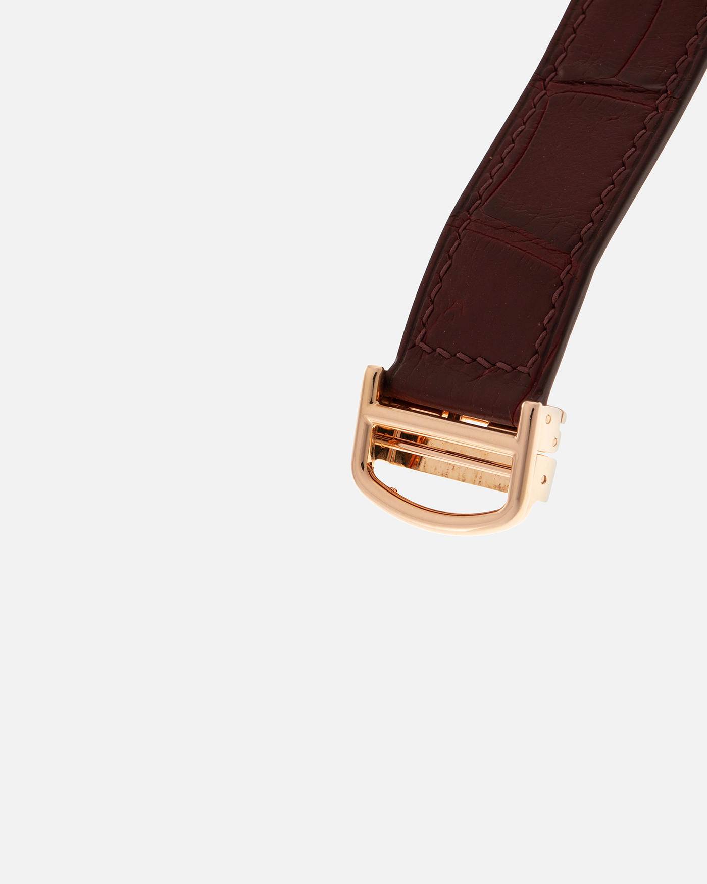 Brand: Cartier
Year: 2009
Model: Collection Privée Cartier Paris Tank Louis XL, Limited to approximately 250 pieces in Rose Gold
Reference: 2714
Material: 18-carat Rose Gold
Movement: Cartier Cal. 9701 MC (Piaget-Based), Manual-Winding
Case Dimensions: 40mm (Including Lugs) x 30mm x 6.2mm
Lug Width: 21mm
Strap: Custom Burgundy-Brown Alligator Leather Strap with Signed 18-carat Rose Gold Deployant Clasp