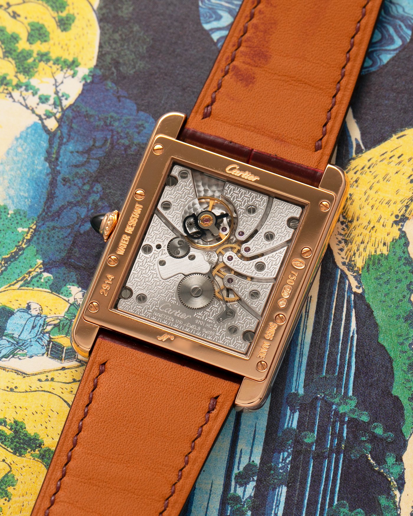 Brand: Cartier
Year: 2009
Model: Collection Privée Cartier Paris Tank Louis XL, Limited to approximately 250 pieces in Rose Gold
Reference: 2714
Material: 18-carat Rose Gold
Movement: Cartier Cal. 9701 MC (Piaget-Based), Manual-Winding
Case Dimensions: 40mm (Including Lugs) x 30mm x 6.2mm
Lug Width: 21mm
Strap: Custom Burgundy-Brown Alligator Leather Strap with Signed 18-carat Rose Gold Deployant Clasp