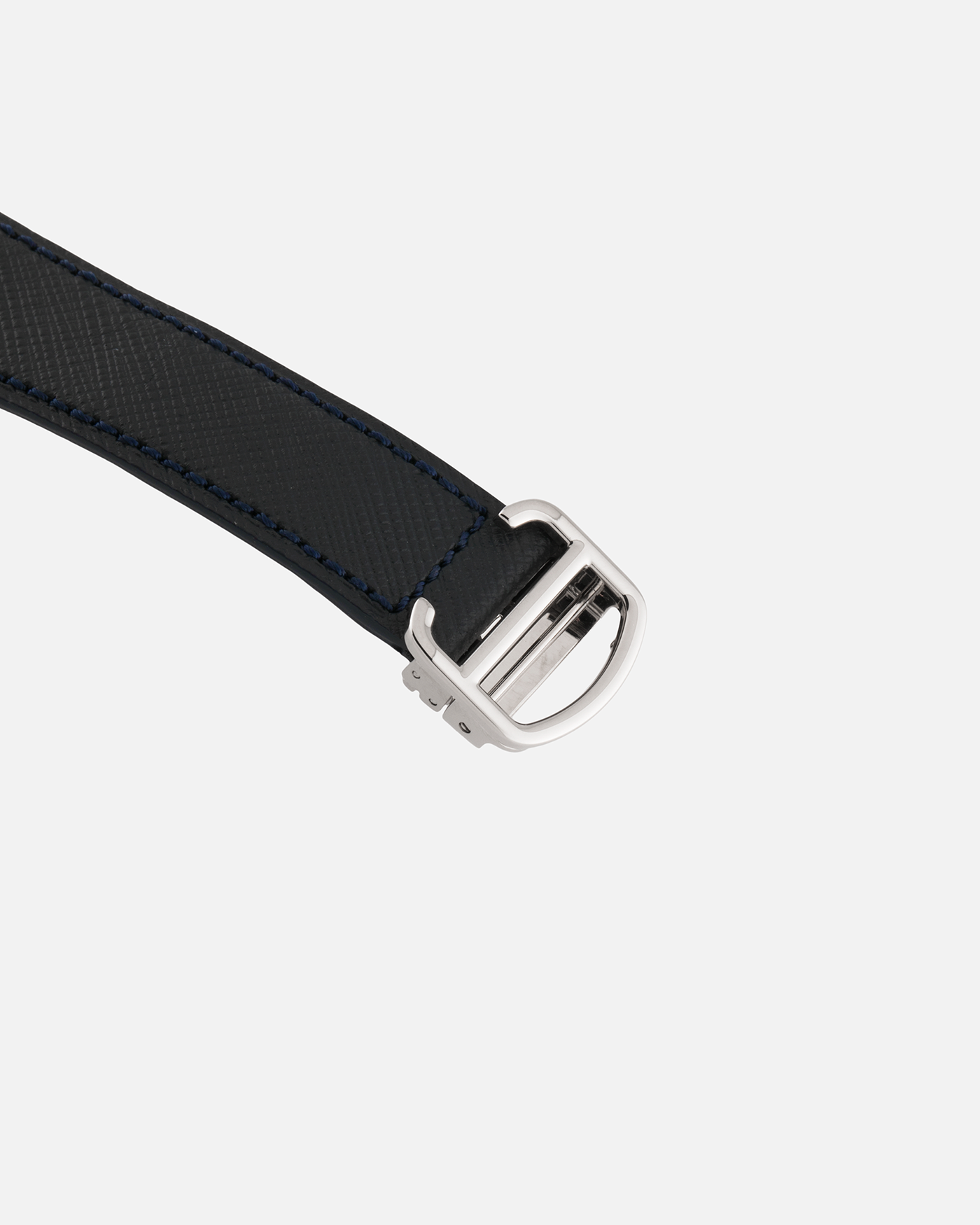 Brand: Cartier
Year: 2015
Model: Tank Louis Cartier Sapphire Skeleton
Reference: W5310012
Material: 18k White Gold
Movement: Manual-Winding Cartier Calibre 9616 MC
Case Dimensions: 39.2mm by 30mm, 7.45mm Thickness
Strap: Navy Blue Molequin Textured Calf Strap, Grey Blue Cartier Alligator Strap, Sealed Black Cartier Alligator Strap with 18k White Gold Cartier Deployant Buckle