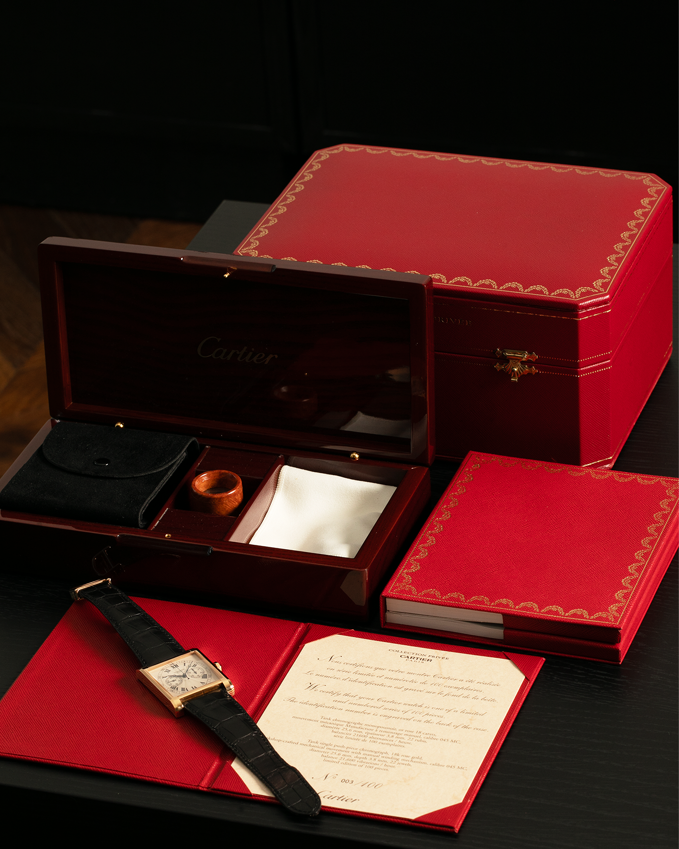 Brand: Cartier
Year: 2000’s
Model: Collection Privée Cartier Paris Tank Monopoussoir
Reference: 2846
Material: 18-carat Rose Gold
Movement: Cartier-THA Cal. 045MC, Manual-Winding
Case Dimensions: 43mm (Including Lugs) x 32 mm
Lug Width: 25mm
Strap: Cartier Black Alligator Leather Strap with Signed 18-carat Rose Gold Deployant Clasp