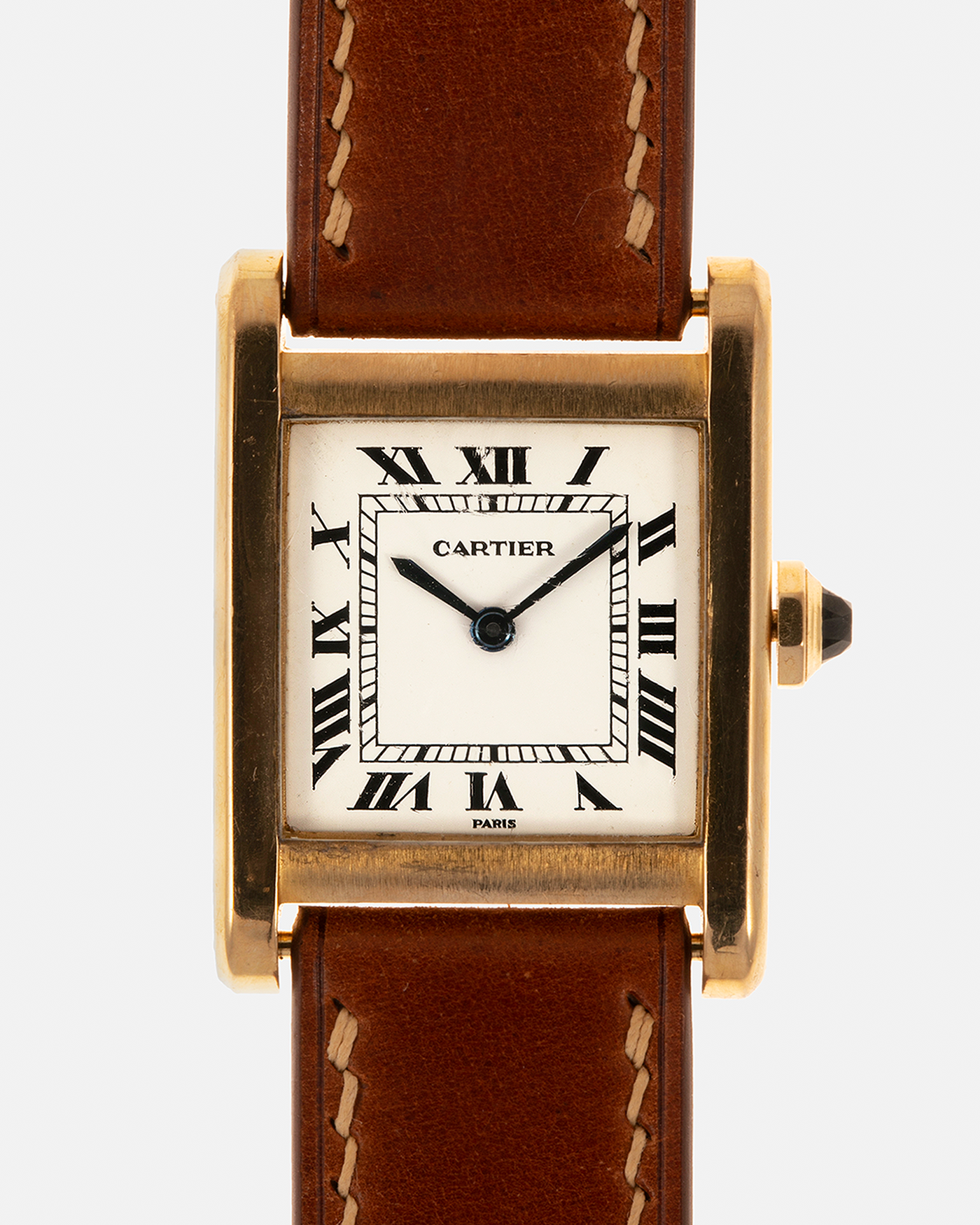 Brand: Cartier
Year: 1976
Model: Tank Normale
Reference Number: 78092
Material: 18-carat Yellow Gold
Movement: Cartier Cal. 78-1, Manual-Winding
Case Diameter: 30mm (Lug-to-Lug) x 22mm x 6.6mm
Lug Width: 17mm
Strap: Custom Tanned Brown Calf Leather Strap with Signed 18-carat Yellow Gold ‘London’ Deployant Clasp