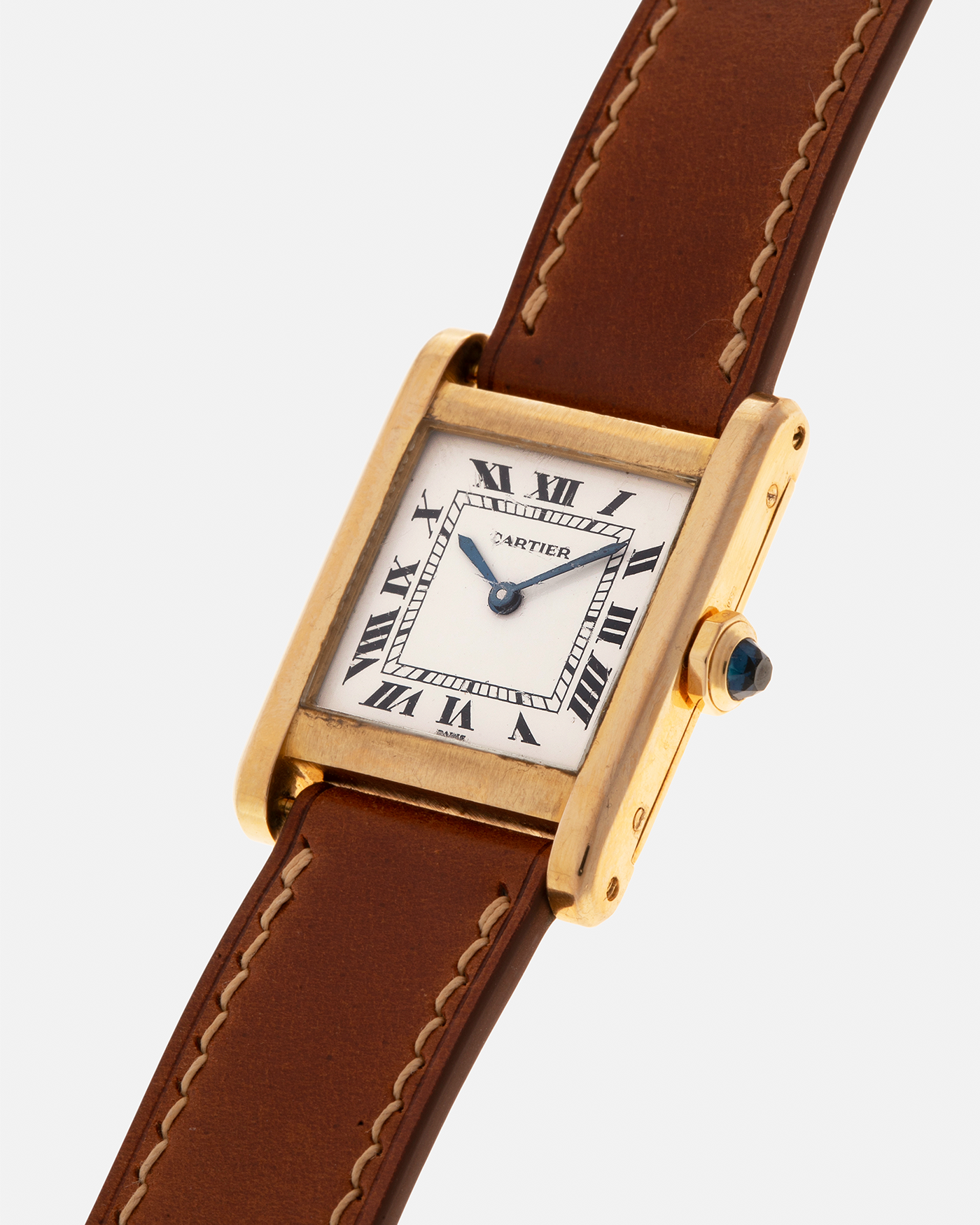 Brand: Cartier
Year: 1976
Model: Tank Normale
Reference Number: 78092
Material: 18-carat Yellow Gold
Movement: Cartier Cal. 78-1, Manual-Winding
Case Diameter: 30mm (Lug-to-Lug) x 22mm x 6.6mm
Lug Width: 17mm
Strap: Custom Tanned Brown Calf Leather Strap with Signed 18-carat Yellow Gold ‘London’ Deployant Clasp