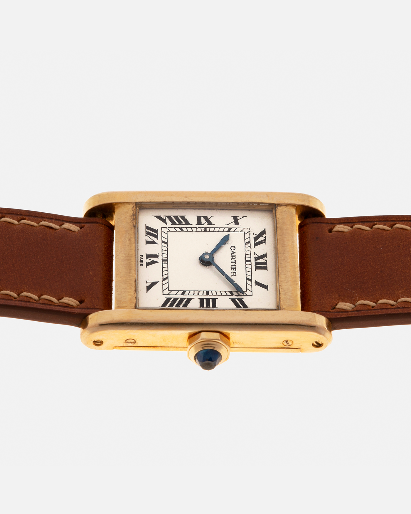 Brand: Cartier
Year: 1976
Model: Tank Normale
Reference Number: 78092
Material: 18-carat Yellow Gold
Movement: Cartier Cal. 78-1, Manual-Winding
Case Diameter: 30mm (Lug-to-Lug) x 22mm x 6.6mm
Lug Width: 17mm
Strap: Custom Tanned Brown Calf Leather Strap with Signed 18-carat Yellow Gold ‘London’ Deployant Clasp