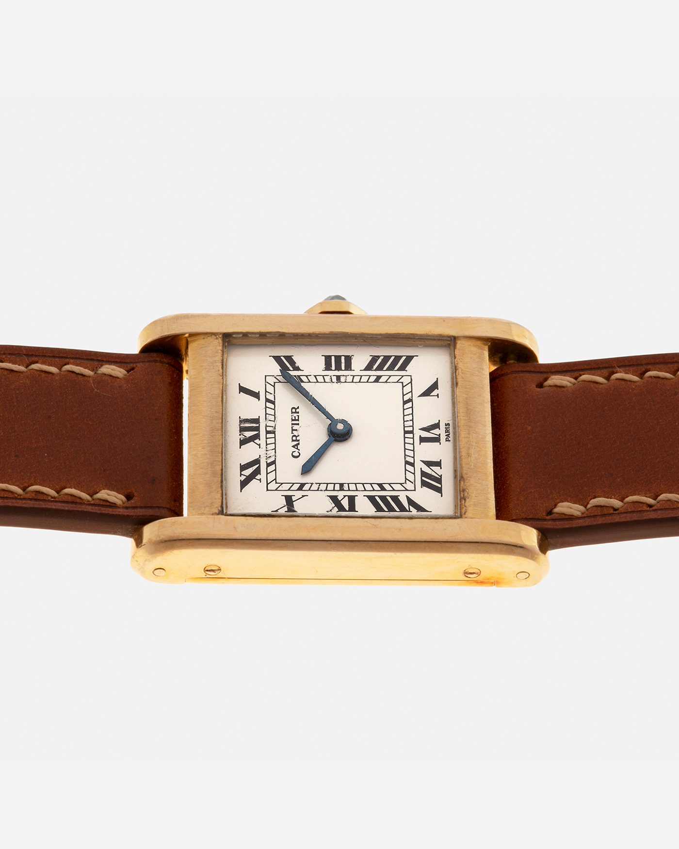 Brand: Cartier
Year: 1976
Model: Tank Normale
Reference Number: 78092
Material: 18-carat Yellow Gold
Movement: Cartier Cal. 78-1, Manual-Winding
Case Diameter: 30mm (Lug-to-Lug) x 22mm x 6.6mm
Lug Width: 17mm
Strap: Custom Tanned Brown Calf Leather Strap with Signed 18-carat Yellow Gold ‘London’ Deployant Clasp