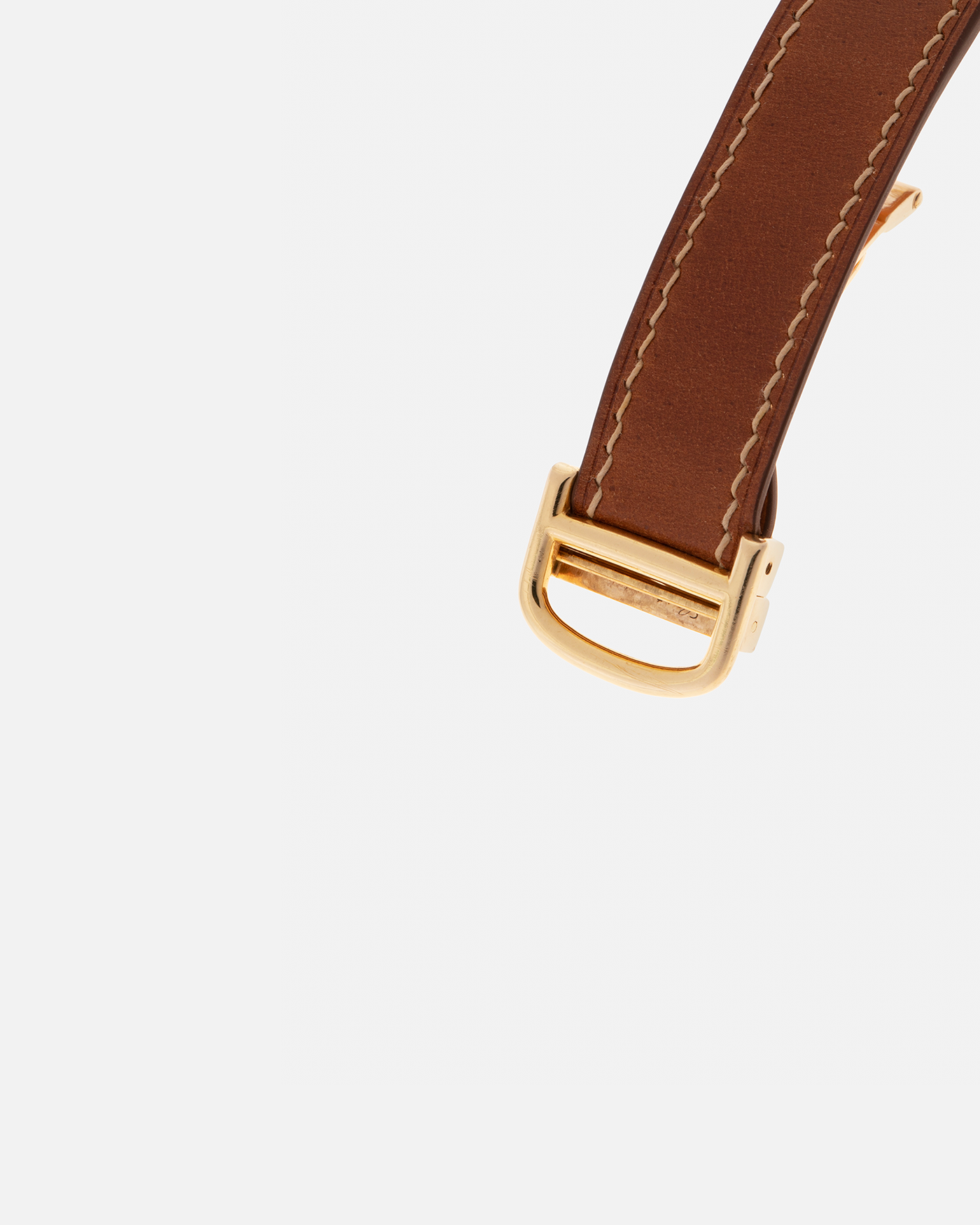 Brand: Cartier
Year: 1976
Model: Tank Normale
Reference Number: 78092
Material: 18-carat Yellow Gold
Movement: Cartier Cal. 78-1, Manual-Winding
Case Diameter: 30mm (Lug-to-Lug) x 22mm x 6.6mm
Lug Width: 17mm
Strap: Custom Tanned Brown Calf Leather Strap with Signed 18-carat Yellow Gold ‘London’ Deployant Clasp
