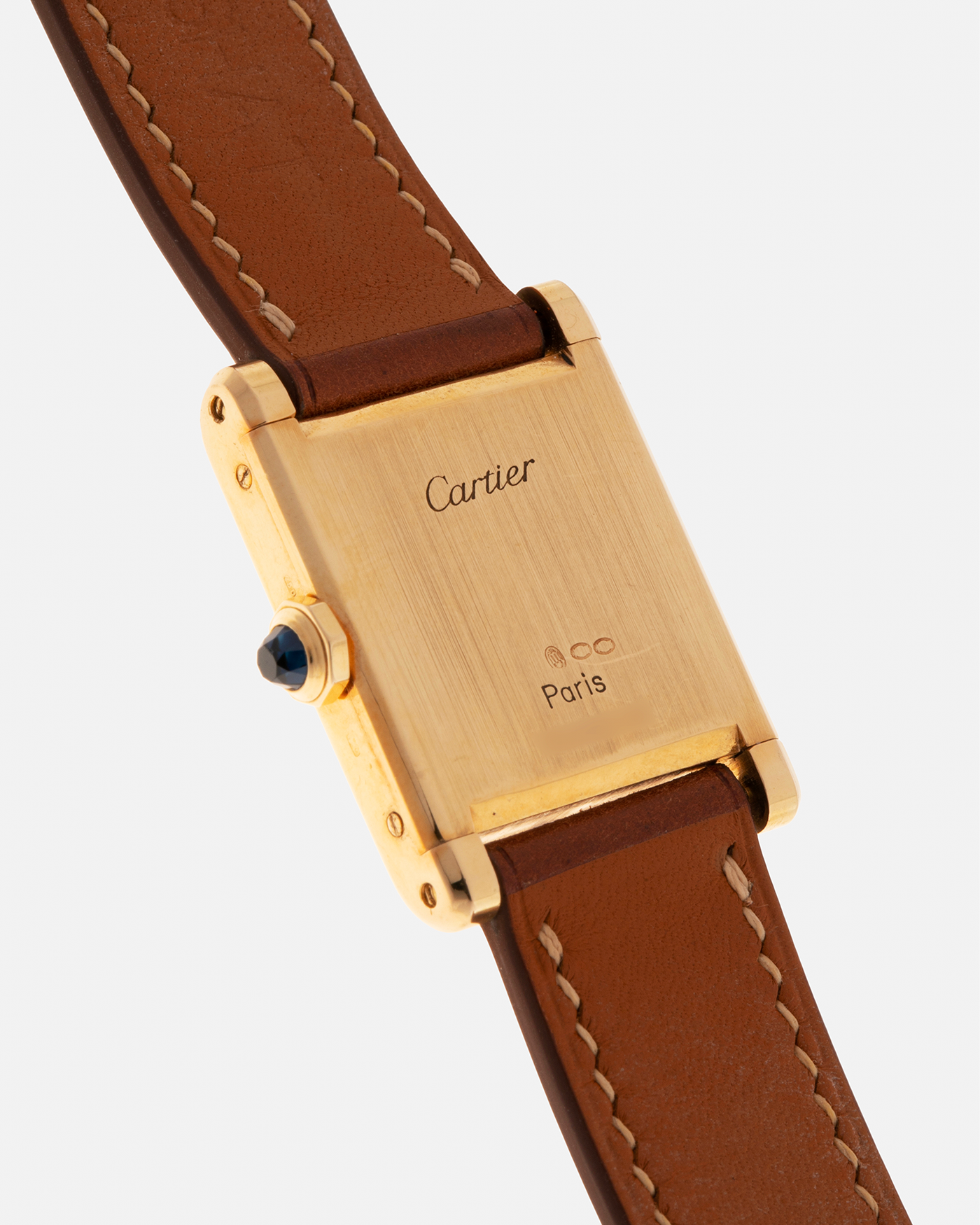 Brand: Cartier
Year: 1976
Model: Tank Normale
Reference Number: 78092
Material: 18-carat Yellow Gold
Movement: Cartier Cal. 78-1, Manual-Winding
Case Diameter: 30mm (Lug-to-Lug) x 22mm x 6.6mm
Lug Width: 17mm
Strap: Custom Tanned Brown Calf Leather Strap with Signed 18-carat Yellow Gold ‘London’ Deployant Clasp