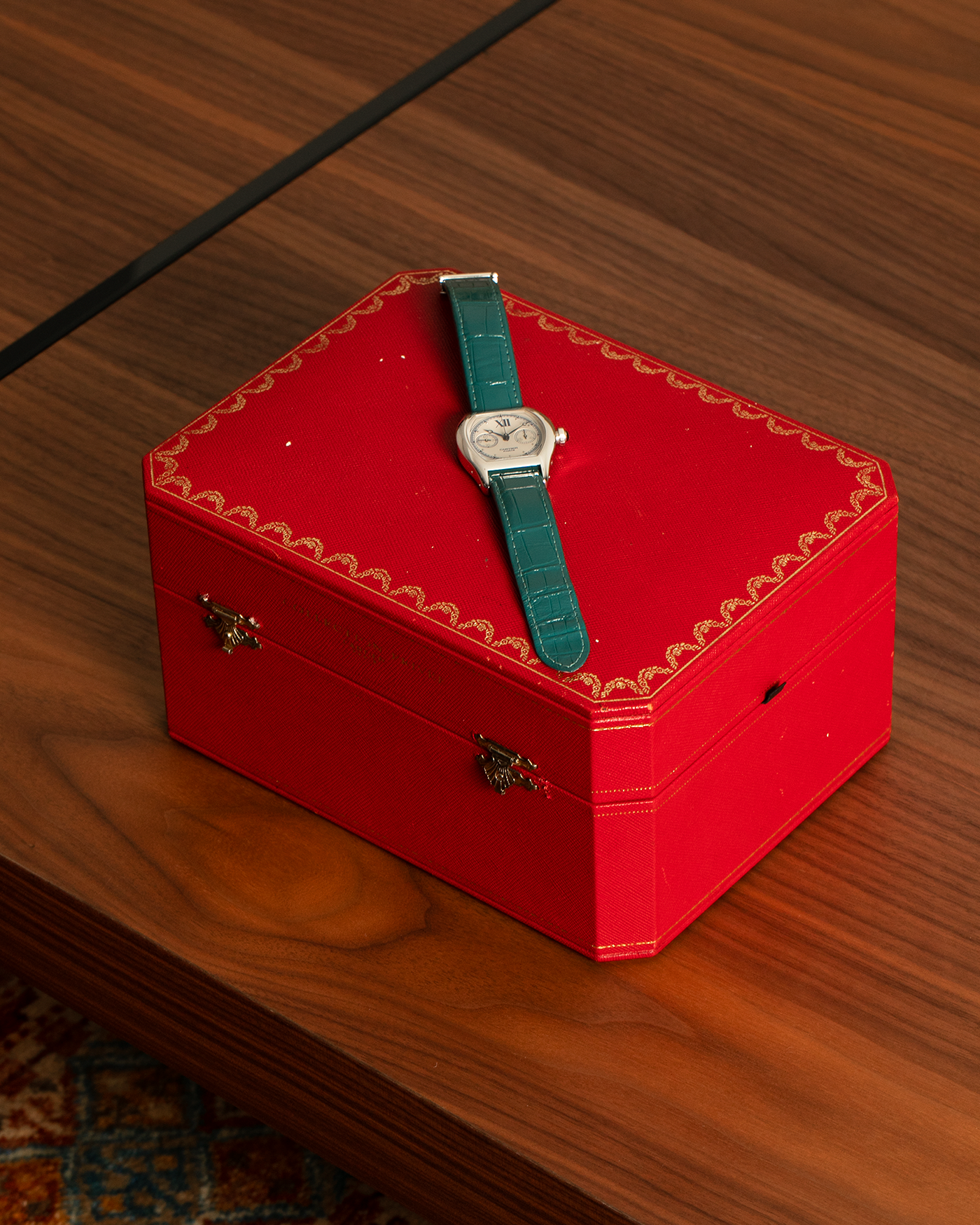 Brand: Cartier
Year: 2000’s
Model: Collection Privée Cartier Paris Tortue Monopoussoir
Reference: 2396
Material: 18k White Gold
Movement: Cartier THA Cal. 045MC, Manual-Winding
Case Diameter: 43mm X 34mm
Lug Width: 18mm
Strap: Cartier Teal Alligator Leather Strap with Cartier 18-carat White Gold Deployant Clasp