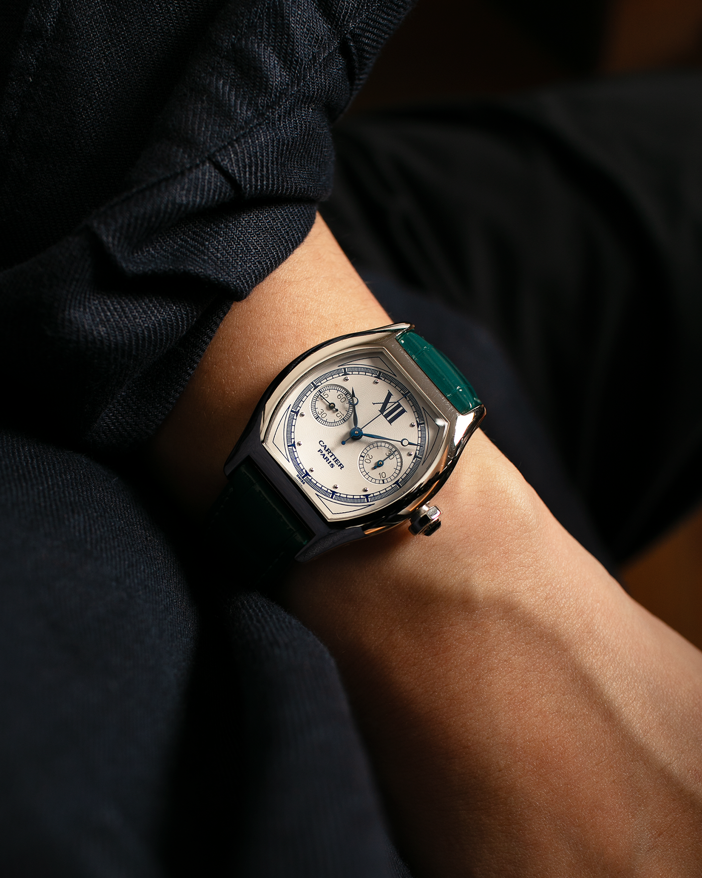 Brand: Cartier
Year: 2000’s
Model: Collection Privée Cartier Paris Tortue Monopoussoir
Reference: 2396
Material: 18k White Gold
Movement: Cartier THA Cal. 045MC, Manual-Winding
Case Diameter: 43mm X 34mm
Lug Width: 18mm
Strap: Cartier Teal Alligator Leather Strap with Cartier 18-carat White Gold Deployant Clasp