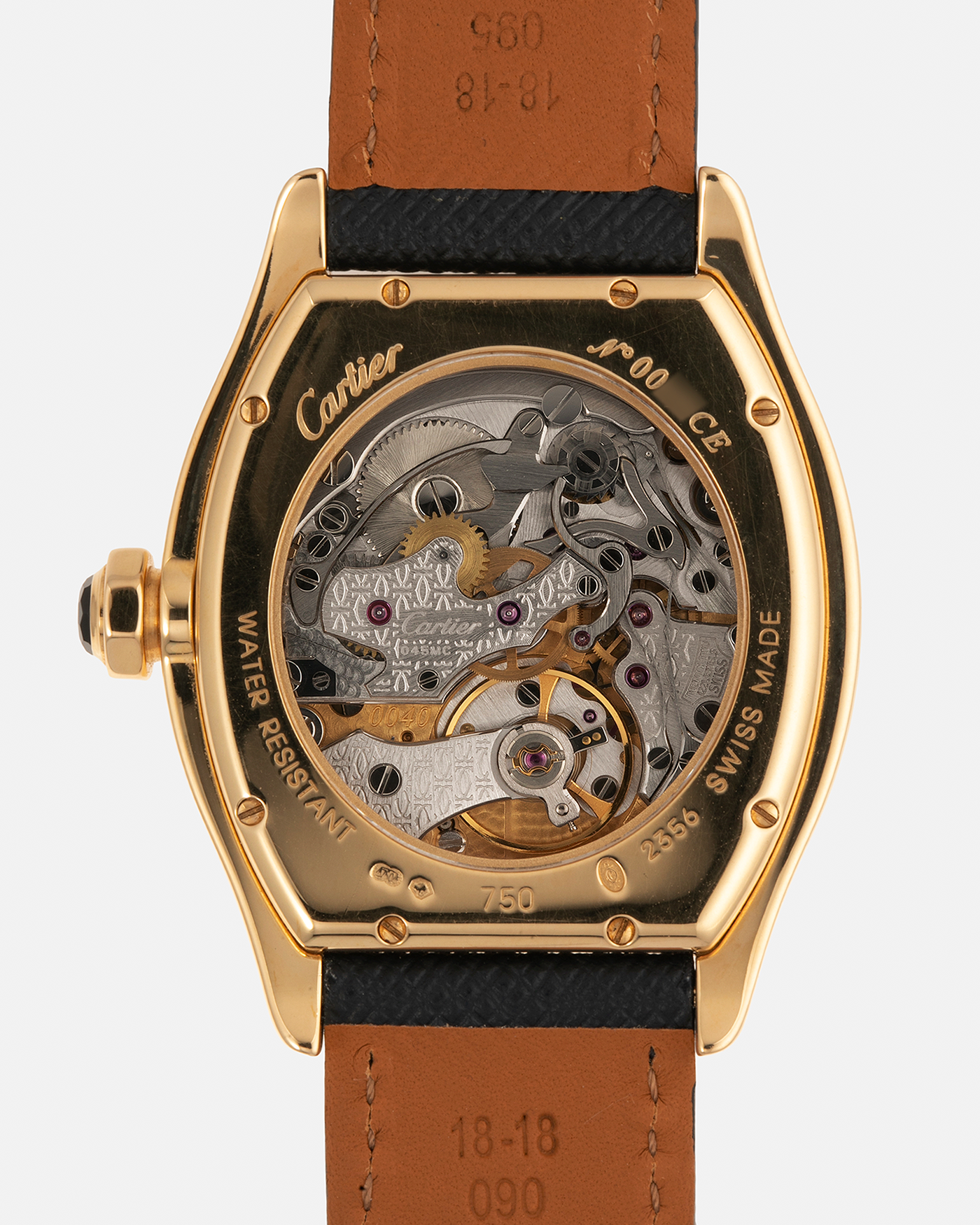Brand: Cartier
Year: 2008
Model: Collection Privée Cartier Paris Tortue Monopoussoir
Reference: 2356
Material: 18-carat Yellow Gold
Movement: Cartier THA Cal. 045MC, Manual-Winding
Case Diameter: 43mm (Lug-to-Lug) x 35 mm
Lug Width: 18mm
Strap: Molequin Navy Blue Textured Calf Leather with Signed 18-carat Yellow Gold Deployant Clasp, with additional Cartier Green Alligator Leather Strap