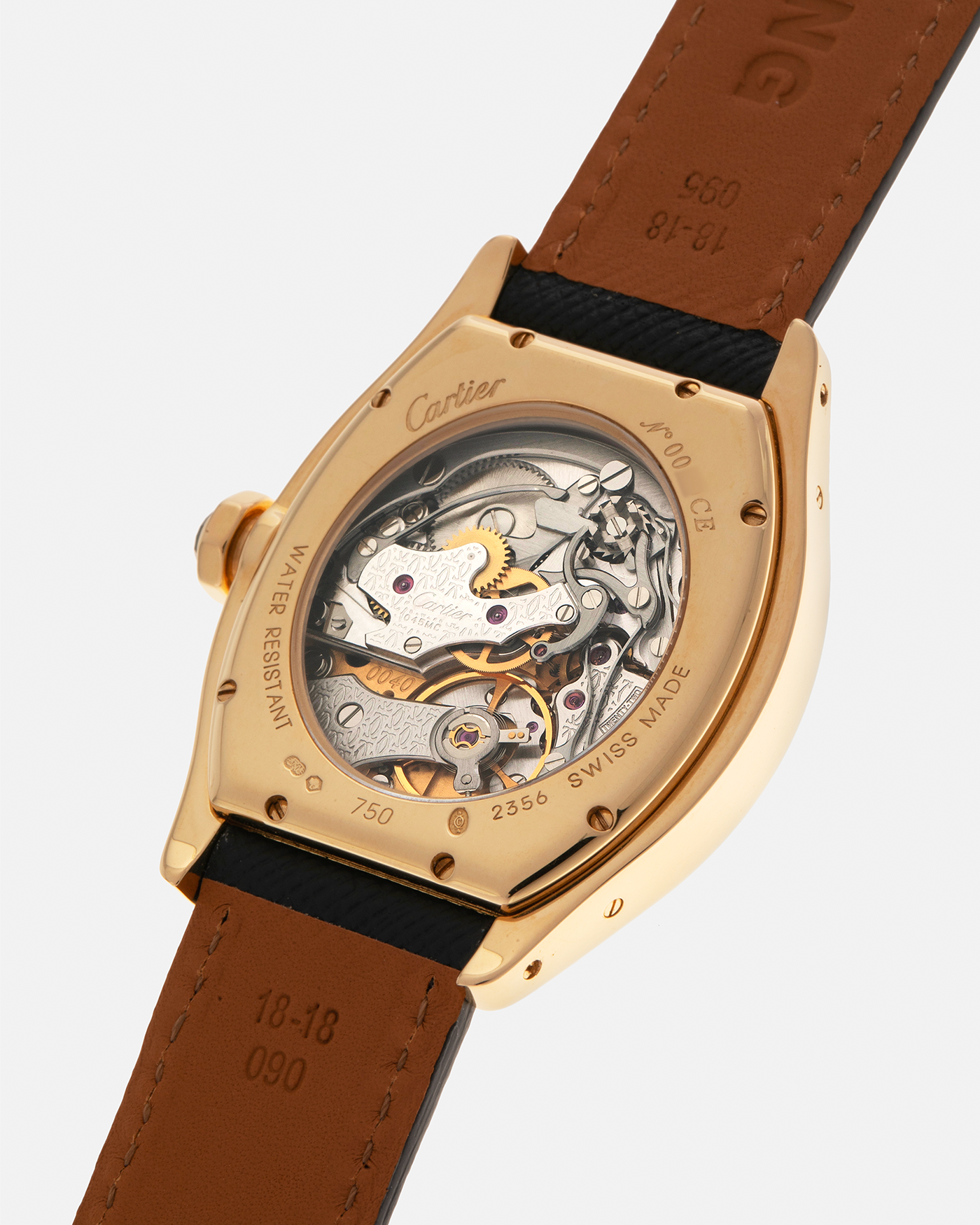 Brand: Cartier
Year: 2008
Model: Collection Privée Cartier Paris Tortue Monopoussoir
Reference: 2356
Material: 18-carat Yellow Gold
Movement: Cartier THA Cal. 045MC, Manual-Winding
Case Diameter: 43mm (Lug-to-Lug) x 35 mm
Lug Width: 18mm
Strap: Molequin Navy Blue Textured Calf Leather with Signed 18-carat Yellow Gold Deployant Clasp, with additional Cartier Green Alligator Leather Strap
