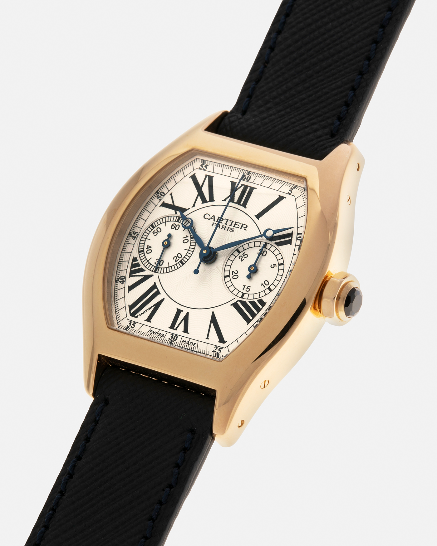 Brand: Cartier
Year: 2008
Model: Collection Privée Cartier Paris Tortue Monopoussoir
Reference: 2356
Material: 18-carat Yellow Gold
Movement: Cartier THA Cal. 045MC, Manual-Winding
Case Diameter: 43mm (Lug-to-Lug) x 35 mm
Lug Width: 18mm
Strap: Molequin Navy Blue Textured Calf Leather with Signed 18-carat Yellow Gold Deployant Clasp, with additional Cartier Green Alligator Leather Strap