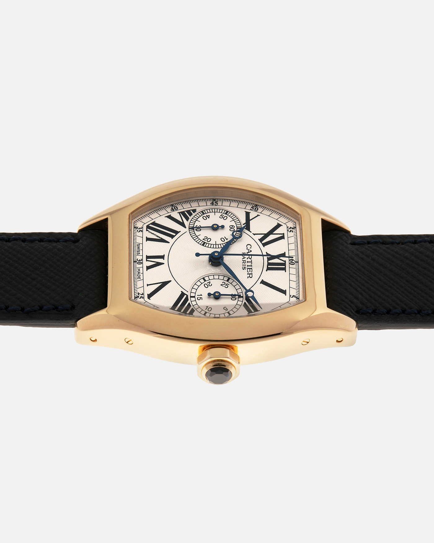Brand: Cartier
Year: 2008
Model: Collection Privée Cartier Paris Tortue Monopoussoir
Reference: 2356
Material: 18-carat Yellow Gold
Movement: Cartier THA Cal. 045MC, Manual-Winding
Case Diameter: 43mm (Lug-to-Lug) x 35 mm
Lug Width: 18mm
Strap: Molequin Navy Blue Textured Calf Leather with Signed 18-carat Yellow Gold Deployant Clasp, with additional Cartier Green Alligator Leather Strap
