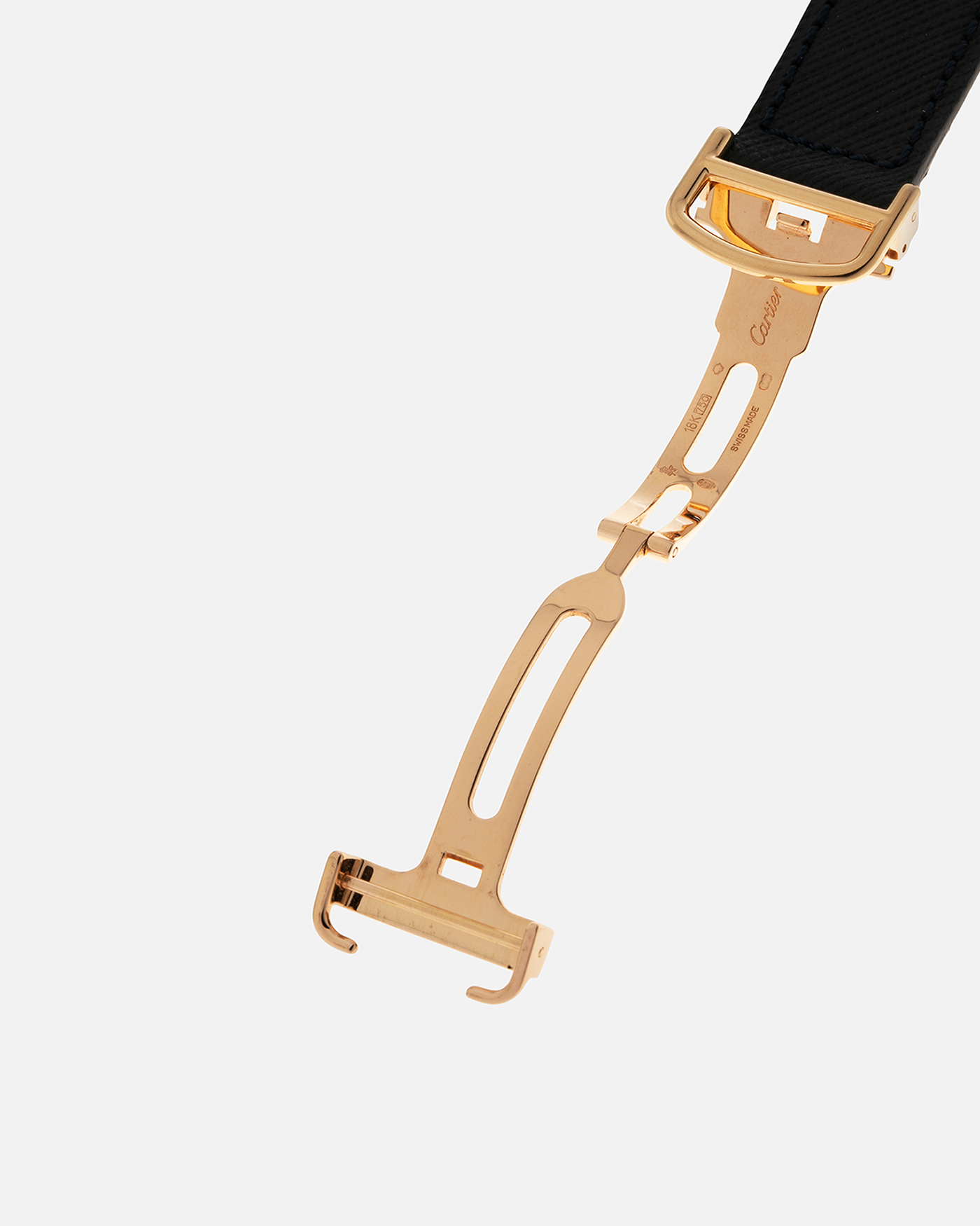 Brand: Cartier
Year: 2008
Model: Collection Privée Cartier Paris Tortue Monopoussoir
Reference: 2356
Material: 18-carat Yellow Gold
Movement: Cartier THA Cal. 045MC, Manual-Winding
Case Diameter: 43mm (Lug-to-Lug) x 35 mm
Lug Width: 18mm
Strap: Molequin Navy Blue Textured Calf Leather with Signed 18-carat Yellow Gold Deployant Clasp, with additional Cartier Green Alligator Leather Strap