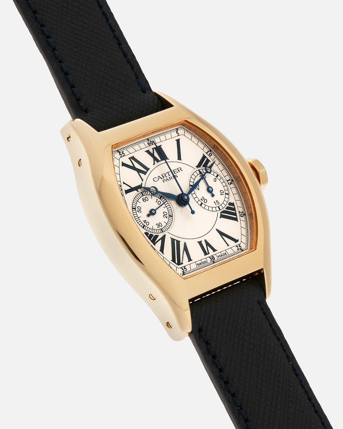 Brand: Cartier Year: 2000’s Model: Collection Privée Cartier Paris Tortue Monopoussoir Reference: 2356E Material: 18-carat Yellow Gold Movement: Cartier THA Cal. 045MC, Manual-Winding Case Diameter: 43mm x 35 mm Lug Width: 18mm Strap: Molequin Navy Blue Textured Calf Leather with Signed 18-carat Yellow Gold Deployant Clasp