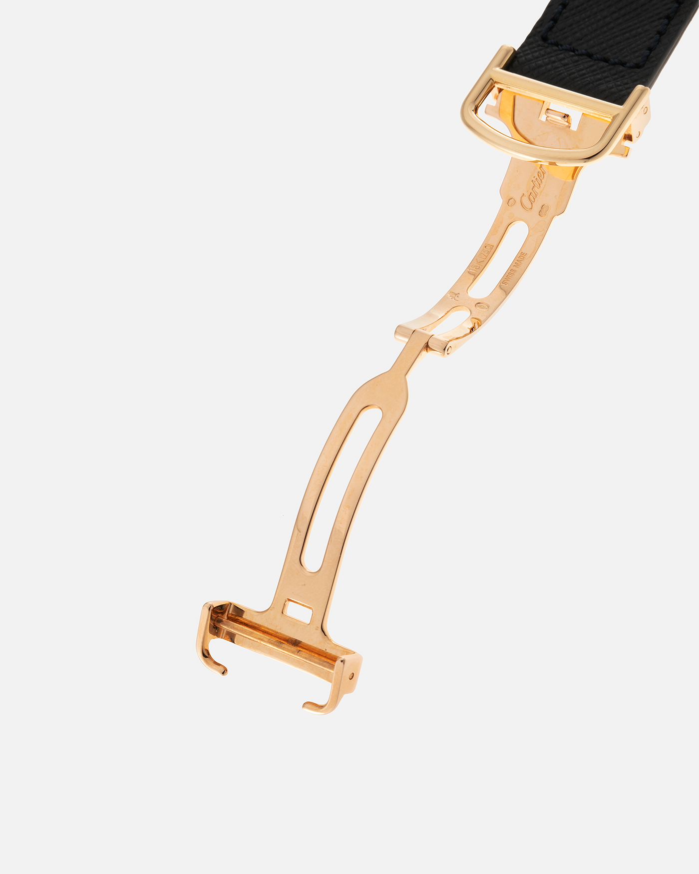 Brand: Cartier Year: 2000’s Model: Collection Privée Cartier Paris Tortue Monopoussoir Reference: 2356E Material: 18-carat Yellow Gold Movement: Cartier THA Cal. 045MC, Manual-Winding Case Diameter: 43mm x 35 mm Lug Width: 18mm Strap: Molequin Navy Blue Textured Calf Leather with Signed 18-carat Yellow Gold Deployant Clasp