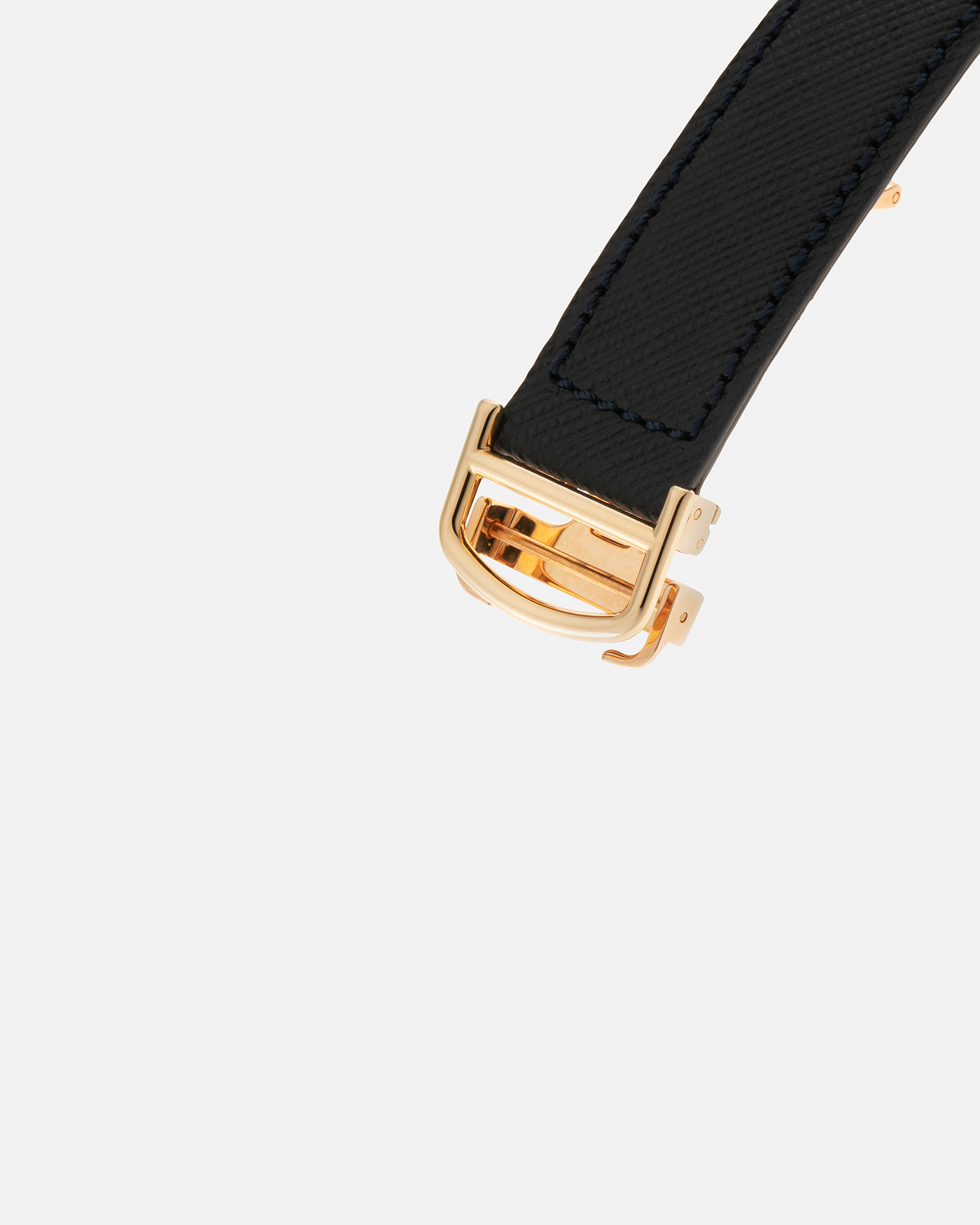 Brand: Cartier Year: 2000’s Model: Collection Privée Cartier Paris Tortue Monopoussoir Reference: 2356E Material: 18-carat Yellow Gold Movement: Cartier THA Cal. 045MC, Manual-Winding Case Diameter: 43mm x 35 mm Lug Width: 18mm Strap: Molequin Navy Blue Textured Calf Leather with Signed 18-carat Yellow Gold Deployant Clasp