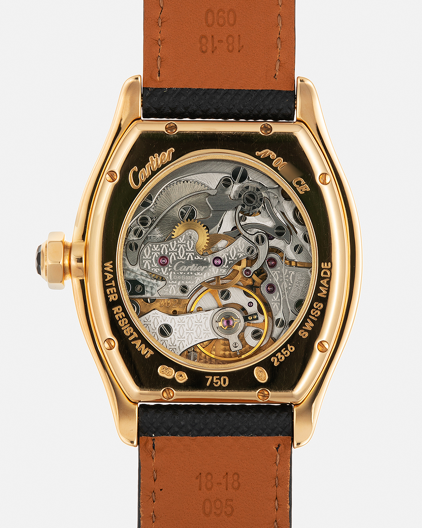 Brand: Cartier Year: 2000’s Model: Collection Privée Cartier Paris Tortue Monopoussoir Reference: 2356E Material: 18-carat Yellow Gold Movement: Cartier THA Cal. 045MC, Manual-Winding Case Diameter: 43mm x 35 mm Lug Width: 18mm Strap: Molequin Navy Blue Textured Calf Leather with Signed 18-carat Yellow Gold Deployant Clasp