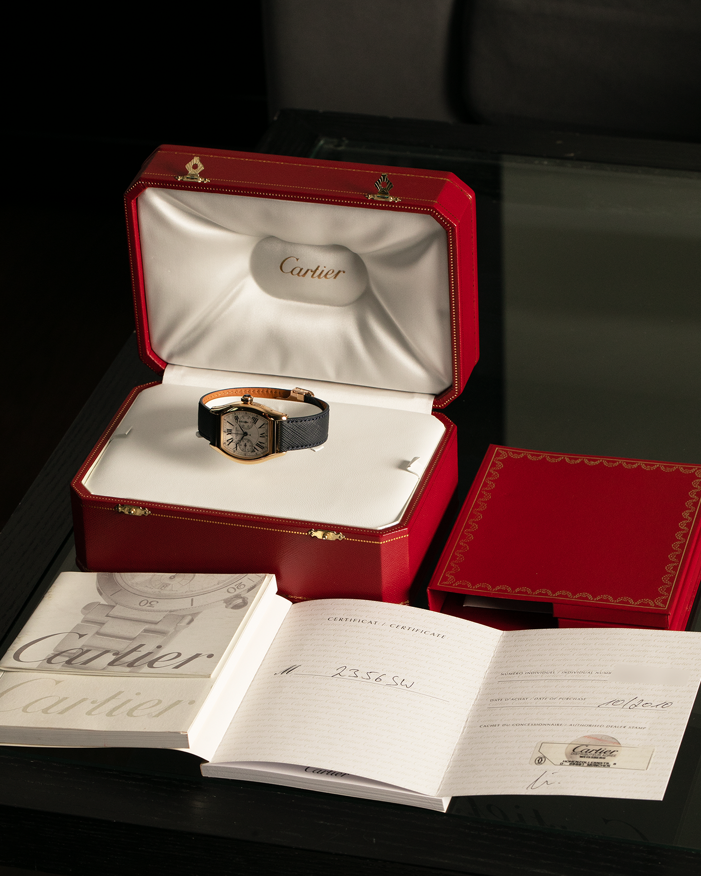 Brand: Cartier Year: 2000’s Model: Collection Privée Cartier Paris Tortue Monopoussoir Reference: 2356E Material: 18-carat Yellow Gold Movement: Cartier THA Cal. 045MC, Manual-Winding Case Diameter: 43mm x 35 mm Lug Width: 18mm Strap: Molequin Navy Blue Textured Calf Leather with Signed 18-carat Yellow Gold Deployant Clasp