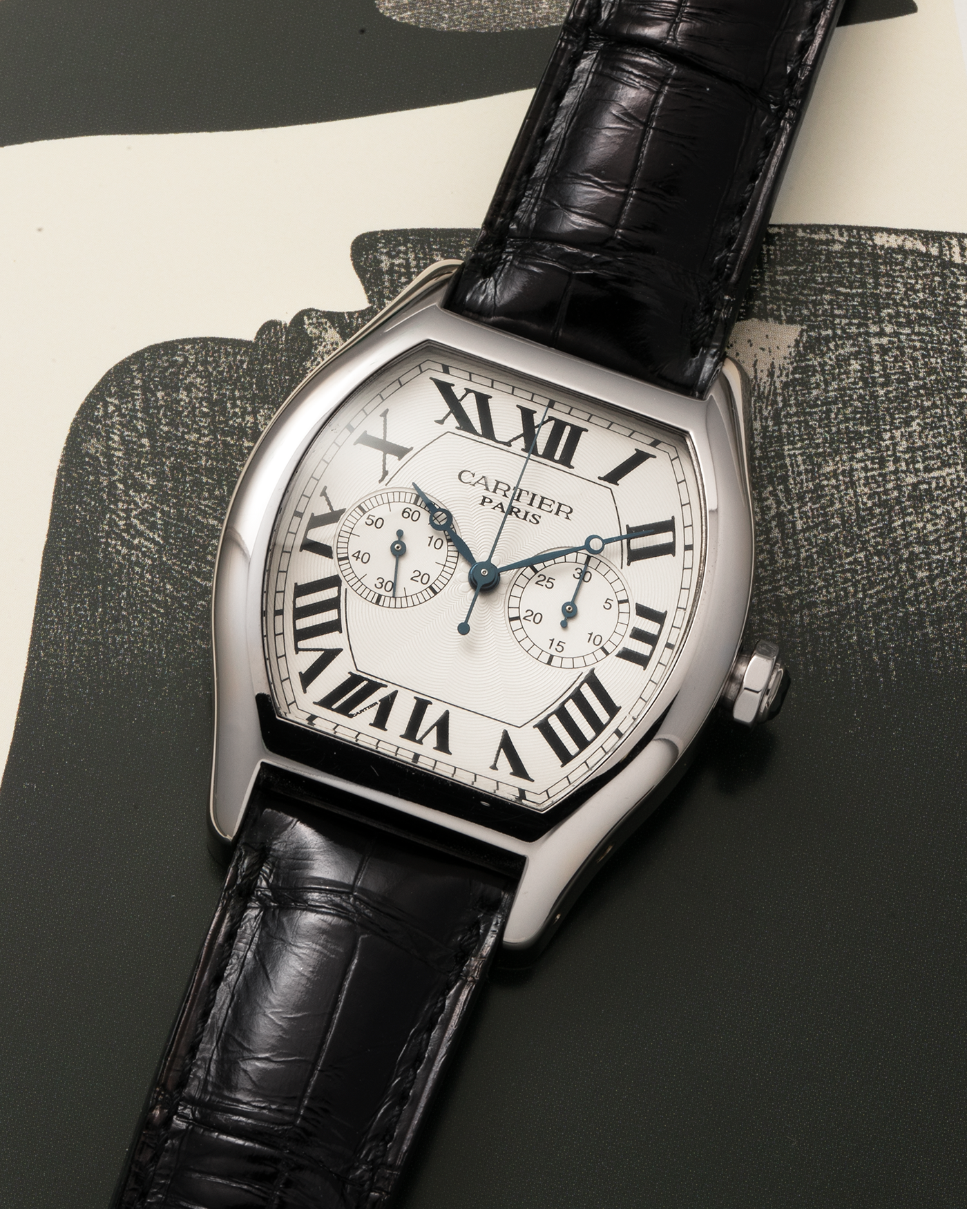 Brand: Cartier Year: 2000s Model: CPCP Collection Prive Tortue Monopoussoir XL Reference: 2762 Material: 18-carat White Gold Movement: THA Cal. 045MC, Manual-Winding Case Dimensions: 37mm x 39 mm Lug Width: 20mm Strap: Jean Rosseau Black Alligator Leather Strap with Signed 18-carat White Gold Deployant Clasp