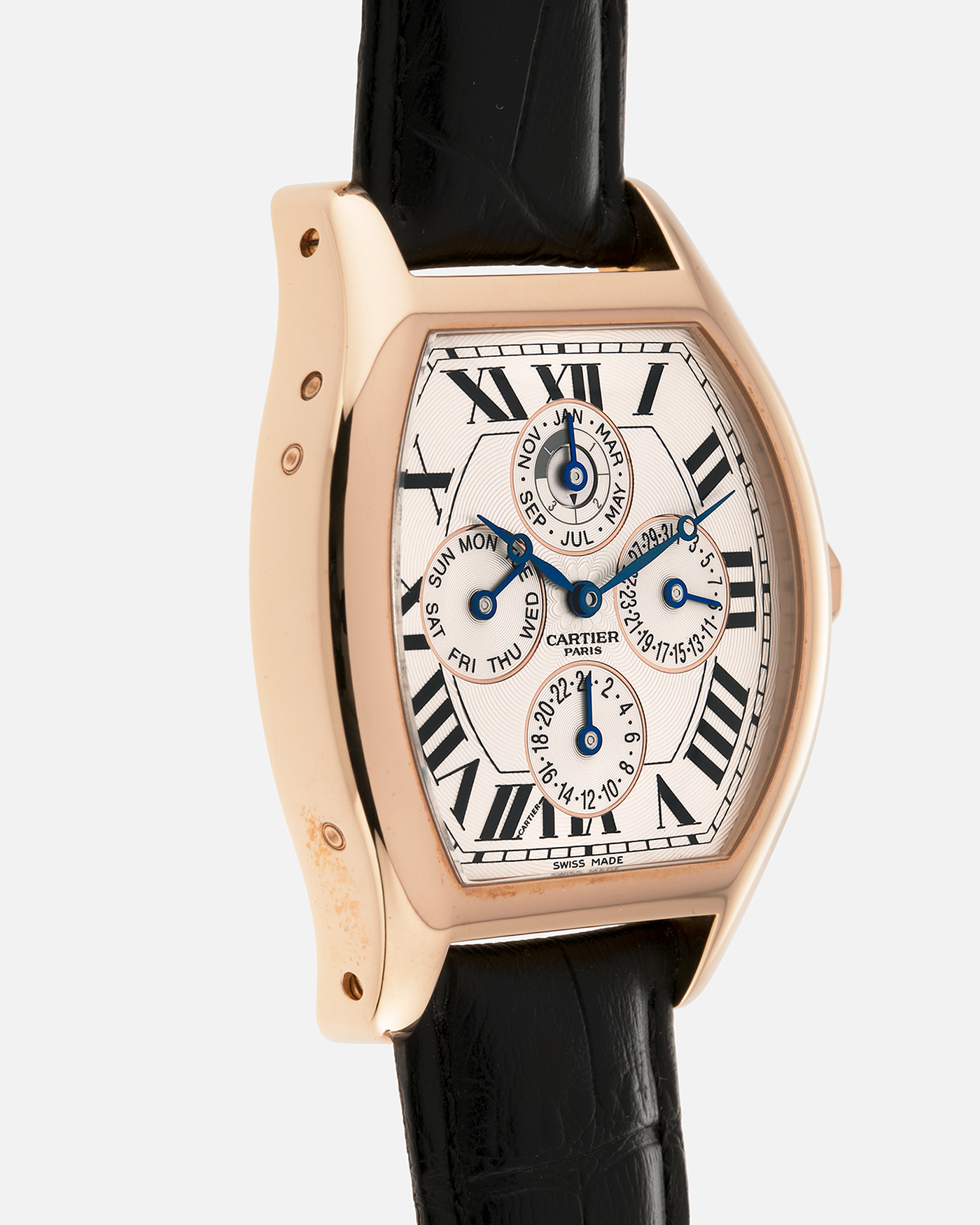 Brand: Cartier
Year: 2005
Model: CPCP Collection Prive Tortue Perpetual Calendar XL
Reference: 2666 / W1542851
Material: 18k Rose Gold
Movement: Cal. 9421MC
Case Diameter: 42.5mm x 34mm (12mm Thickness)
Strap: Cartier Black Alligator with 18k Rose Gold Cartier Deployant