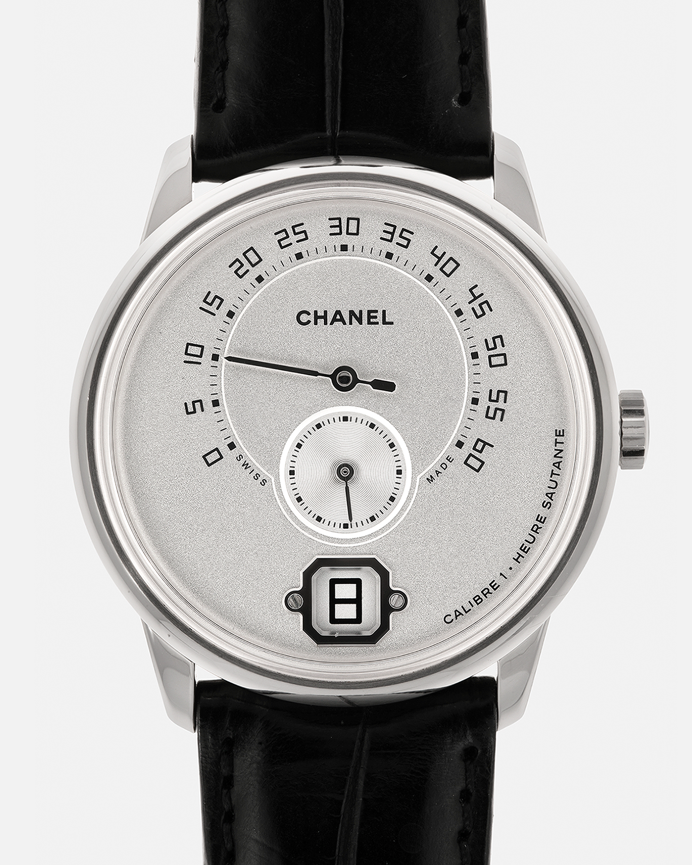 Brand: Chanel
Year: 2017
Model: Monsieur De Chanel Jump Hour H4799
Material: 18-carat White Gold
Movement: Chanel Calibre 1 (Developed with Romain Gauthier), Manual-Winding 
Case Dimensions: 40mm x 10.4mm
Lug Width: 22mm
Strap: Chanel Black Alligator Leather Strap with Signed 18-carat White Gold Tang Buckle