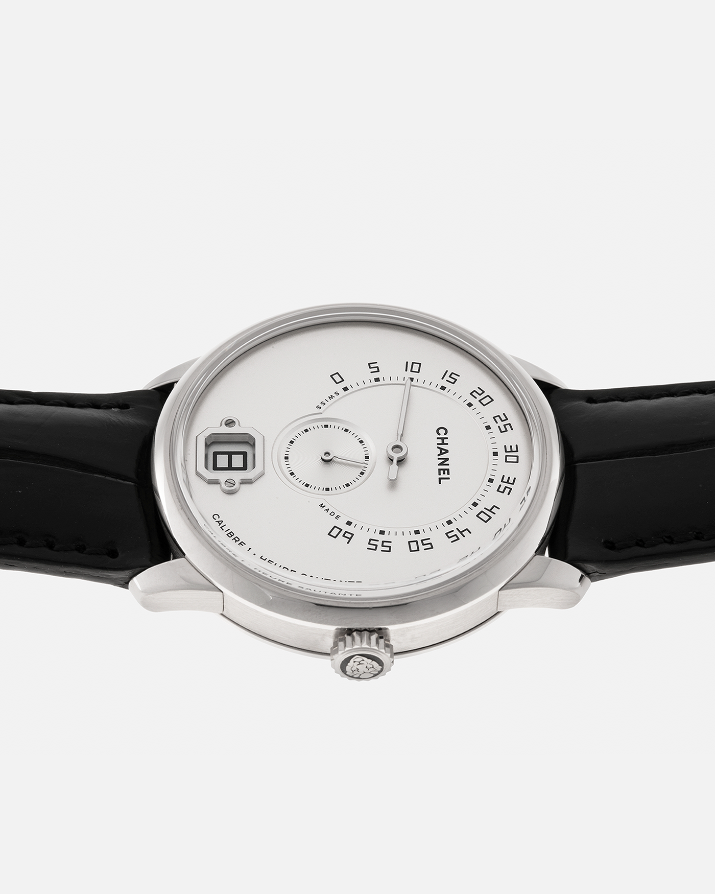 Brand: Chanel
Year: 2017
Model: Monsieur De Chanel Jump Hour H4799
Material: 18-carat White Gold
Movement: Chanel Calibre 1 (Developed with Romain Gauthier), Manual-Winding 
Case Dimensions: 40mm x 10.4mm
Lug Width: 22mm
Strap: Chanel Black Alligator Leather Strap with Signed 18-carat White Gold Tang Buckle