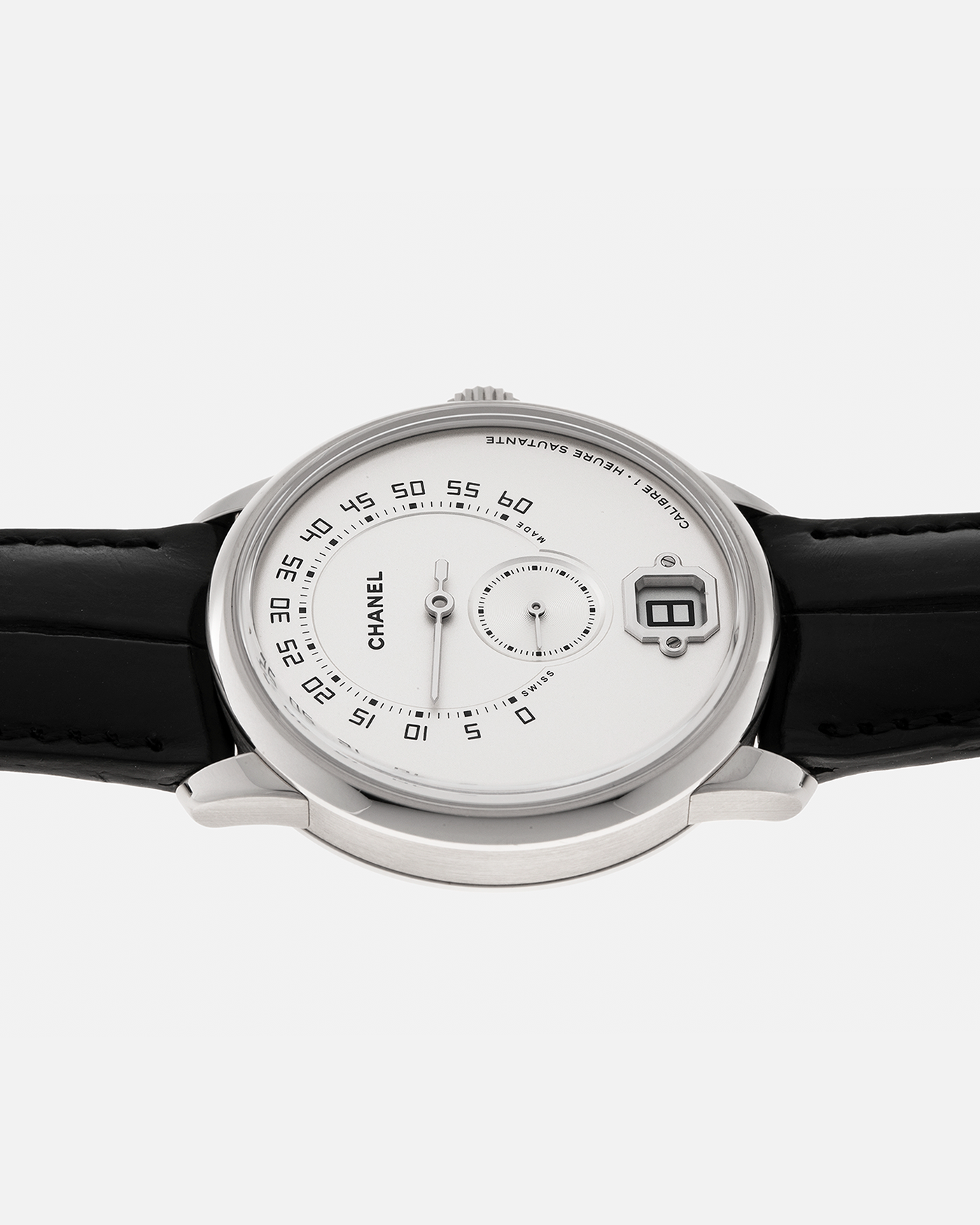 Brand: Chanel
Year: 2017
Model: Monsieur De Chanel Jump Hour H4799
Material: 18-carat White Gold
Movement: Chanel Calibre 1 (Developed with Romain Gauthier), Manual-Winding 
Case Dimensions: 40mm x 10.4mm
Lug Width: 22mm
Strap: Chanel Black Alligator Leather Strap with Signed 18-carat White Gold Tang Buckle