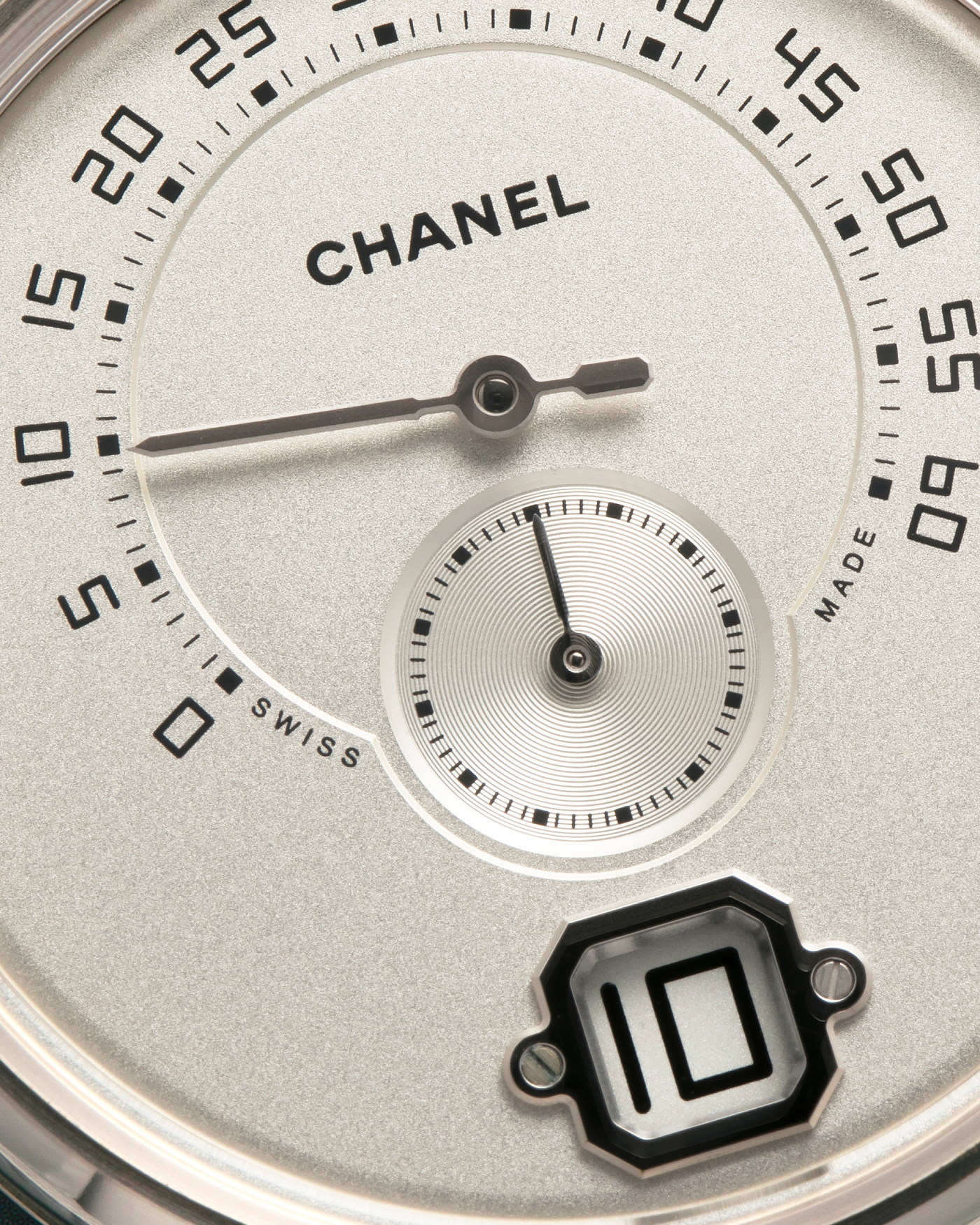 Brand: Chanel
Year: 2017
Model: Monsieur De Chanel Jump Hour H4799
Material: 18-carat White Gold
Movement: Chanel Calibre 1 (Developed with Romain Gauthier), Manual-Winding 
Case Dimensions: 40mm x 10.4mm
Lug Width: 22mm
Strap: Chanel Black Alligator Leather Strap with Signed 18-carat White Gold Tang Buckle
