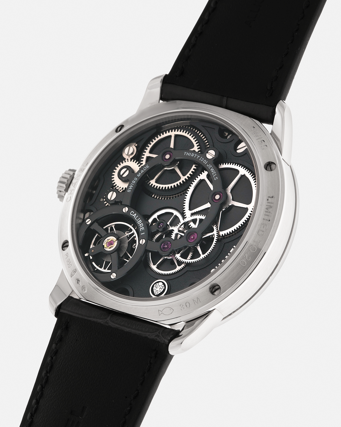 Brand: Chanel
Year: 2018
Model: Monsieur De Chanel Jump Hour, Limited to 20 Pieces
Reference: H5467
Material: Platinum 950 Case and Deployant Clasp, Blue Enamel Dial
Movement: Chanel Calibre 1 (Developed with Romain Gauthier), Manual-Winding 
Case Dimensions: 40mm x 10.4mm
Lug Width: 22mm
Straps: Chanel Grey Alligator Leather Strap with Signed Platinum 950 Deployant Clasp, with extra Chanel Black Alligator Leather Strap (Used)