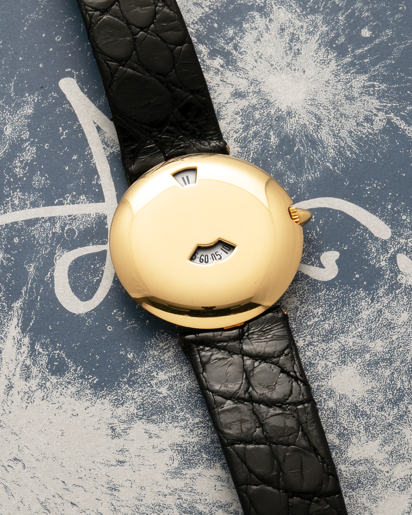 Brand: Chaumet
Year: Early 1990’s
Model: Les Pleiades
Reference Number: 11A
Material: 18k Yellow Gold
Movement: Quartz Jump Hour Movement
Case Dimensions: 30mm
Strap: Black Alligator Strap with 18k Yellow Gold Chaumet Tang Buckle