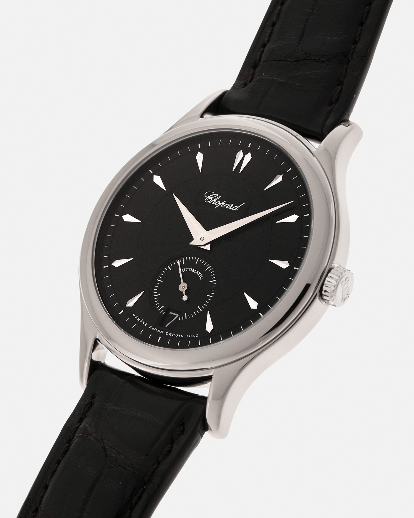 Brand: Chopard L.U.C.
Year: 1998
Model: 16/1860/2
Material: 18-carat White Gold
Movement: Chopard Cal. 1.96, Self-Winding Micro-Rotor
Case Dimensions: 37mm x 8.5mm (Lug-to-Lug 45mm)
Lug Width: 18mm
Strap: Chopard Black Alligator Leather Strap with Signed 18-carat White Gold Tang Buckle