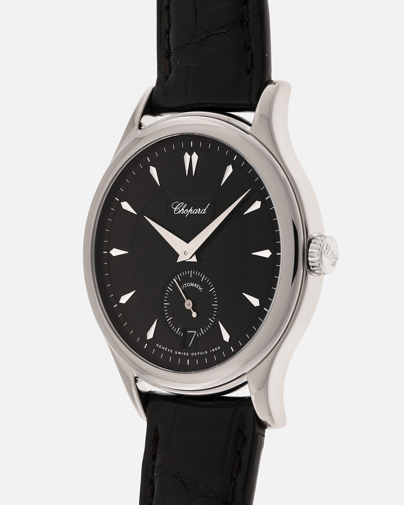 Brand: Chopard L.U.C.
Year: 1998
Model: 16/1860/2
Material: 18-carat White Gold
Movement: Chopard Cal. 1.96, Self-Winding Micro-Rotor
Case Dimensions: 37mm x 8.5mm (Lug-to-Lug 45mm)
Lug Width: 18mm
Strap: Chopard Black Alligator Leather Strap with Signed 18-carat White Gold Tang Buckle