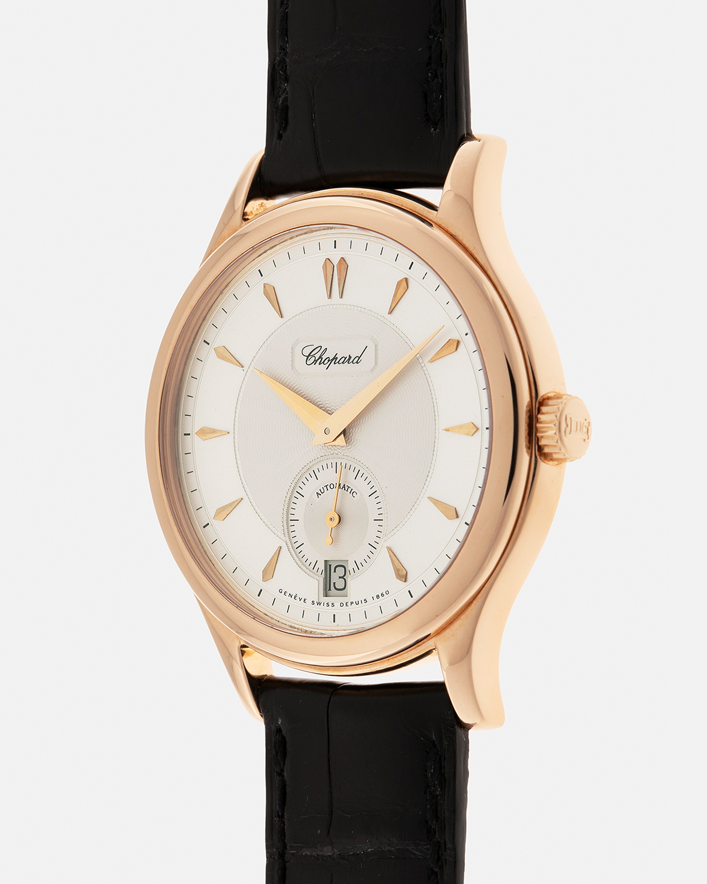 Brand: Chopard L.U.C.
Year: Late 1990’s
Model: 16/1860/2
Material: 18-carat Yellow Gold
Movement: Chopard Cal. 1.96, Self-Winding Micro-Rotor
Case Dimensions: 37mm x 8.5mm (Lug-to-Lug 45mm)
Lug Width: 18mm
Strap: Chopard Black Alligator Leather Strap with Signed 18-carat Yellow Gold Tang Buckle