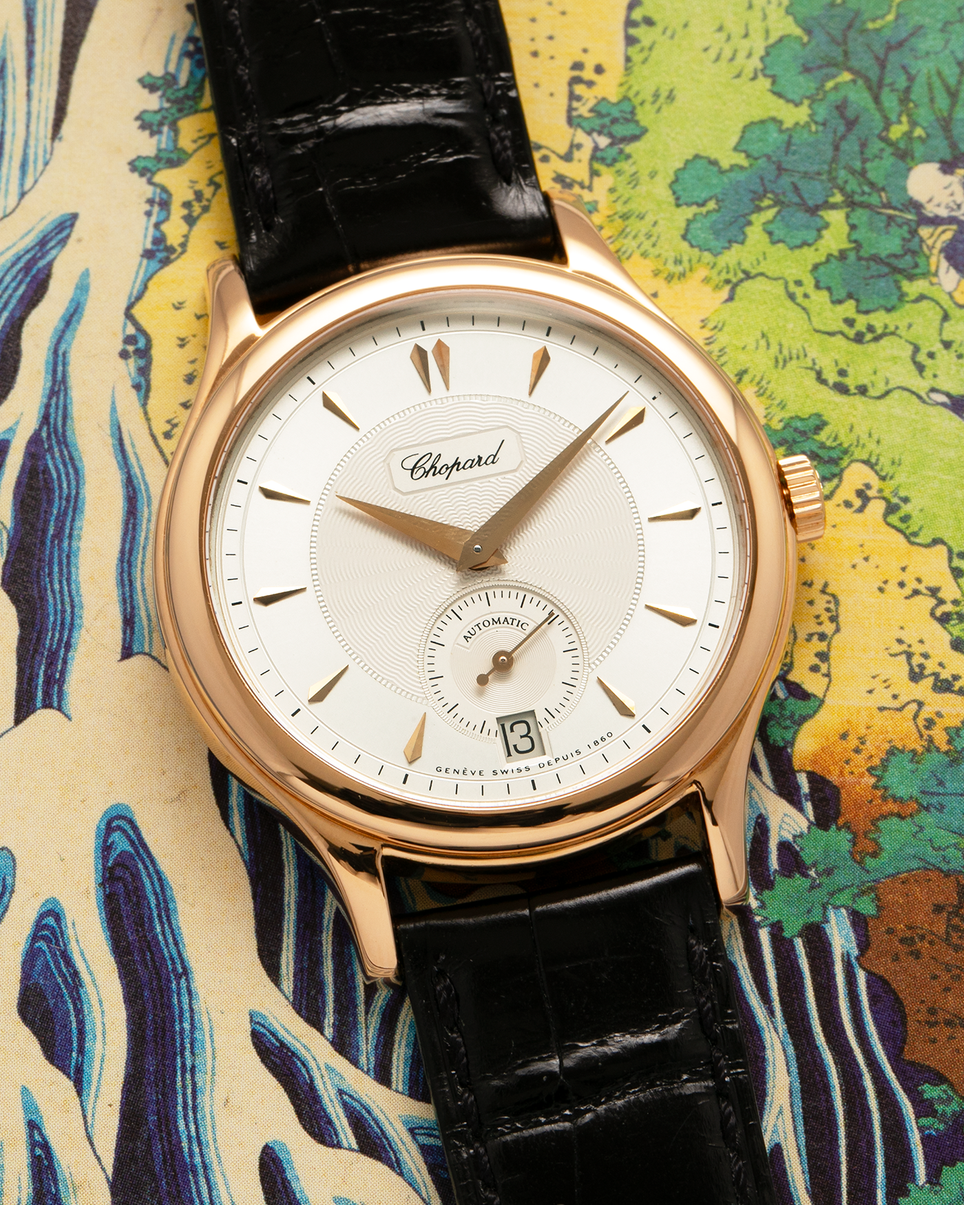 Brand: Chopard L.U.C.
Year: Late 1990’s
Model: 16/1860/2
Material: 18-carat Yellow Gold
Movement: Chopard Cal. 1.96, Self-Winding Micro-Rotor
Case Dimensions: 37mm x 8.5mm (Lug-to-Lug 45mm)
Lug Width: 18mm
Strap: Chopard Black Alligator Leather Strap with Signed 18-carat Yellow Gold Tang Buckle