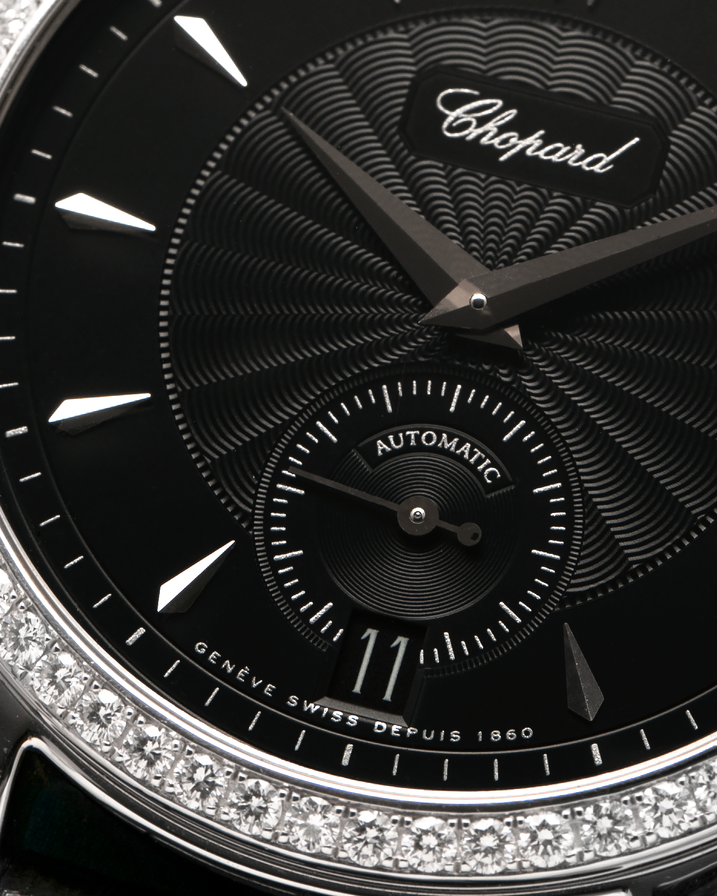 Brand: Chopard L.U.C.
Year: Late 1990s
Model: 17/1860/2
Material: 18-carat White Gold Case, Factory-Set Diamond Bezel
Movement: Chopard Cal. 1.96, Self-Winding Micro-Rotor
Case Dimensions: 37mm x 8.5mm (Lug-to-Lug 45mm)
Lug Width: 18mm
Strap: Chopard Black Alligator Leather Strap with Signed 18-carat White Gold Tang Buckle