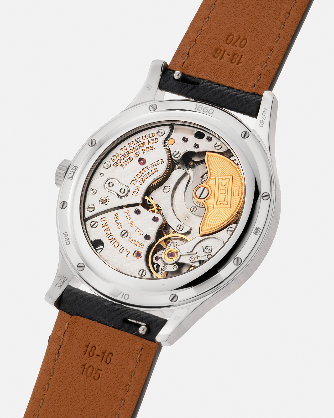 Brand: Chopard L.U.C. Year: 2022 Model / Reference: 16/1860/10018, The Hour Glass Limited Edition of 10 Pieces Serial Number: 425XXXX Material: 18-carat White Gold, Champagne Gold Dial Movement: Chopard Cal. L.U.C. 96.01-L, Self-Winding Case Diameter: 37mm Lug Width: 18mm Strap: Molequin Navy Blue Textured Calf Leather Strap with Signed 18-carat White Gold Tang buckle, and additional Chopard Distressed Sand Leather Strap