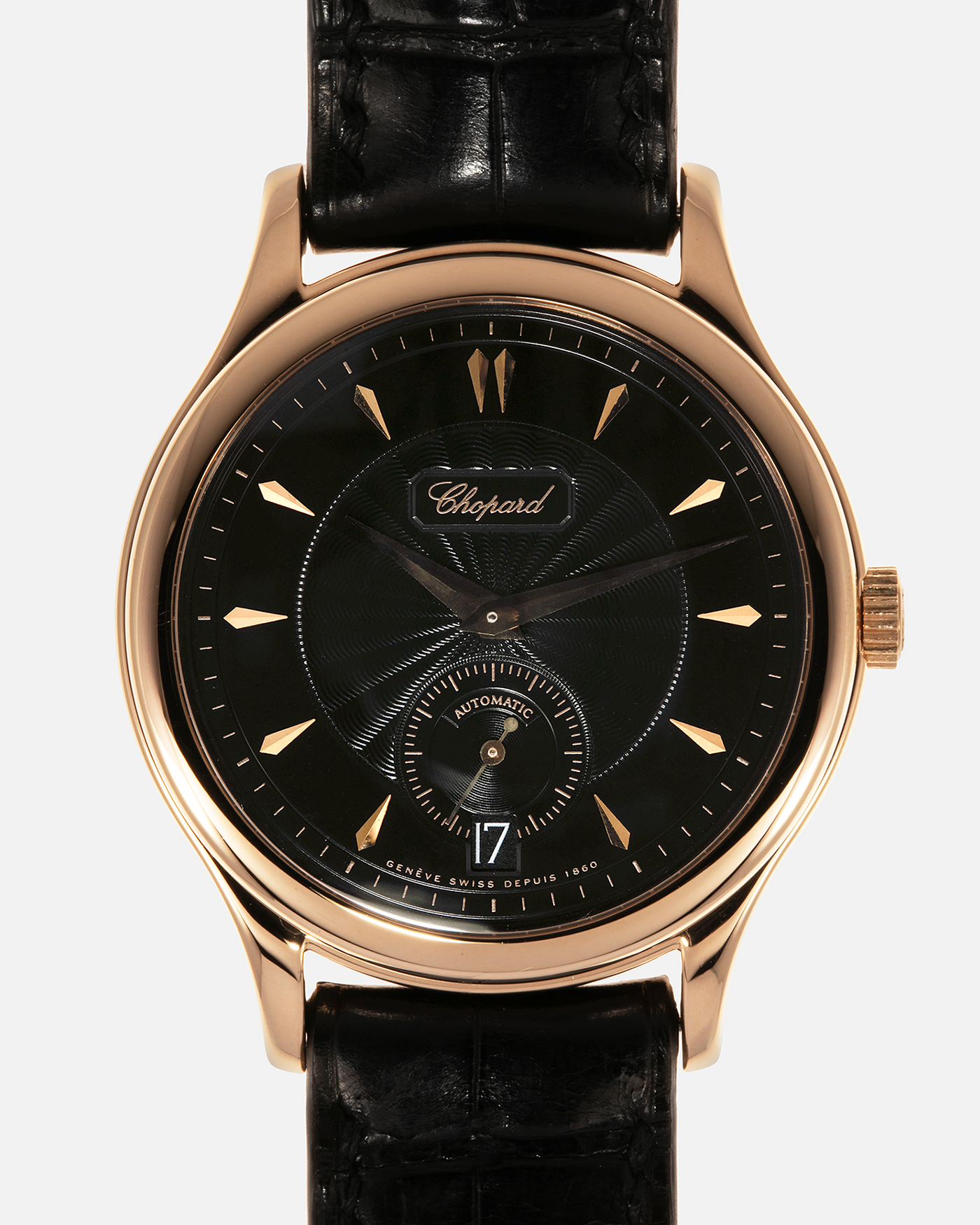 Brand: Chopard L.U.C.
Year: 1990’s
Model: 16/1860/2
Material: 18-carat Rose Gold
Movement: Chopard Cal. 1.96, Self-Winding Micro-Rotor
Case Diameter: 37mm x 8.5mm (Lug-to-Lug 45mm)
Lug Width: 18mm
Strap: Delugs Black Alligator Leather Strap with signed 18-carat Rose Gold Tang Buckle, extra Chopard Black Alligator Leather Strap